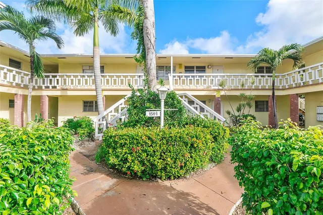 a view of a house with a garden