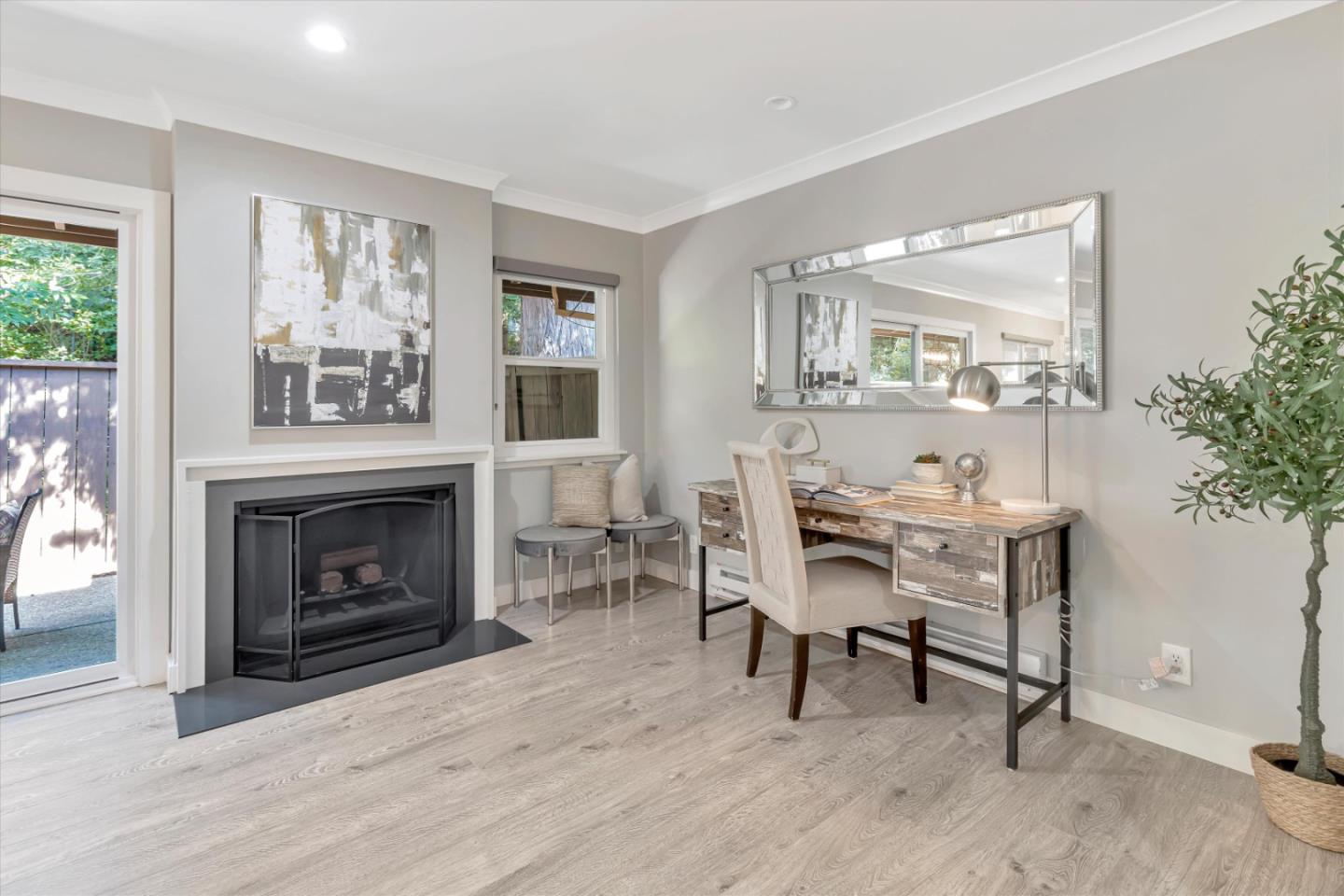 500 West Middlefield Road, Unit 100 Mountain View, CA 94043 - Photo 12 of 47 a workspace with furniture window and a fireplace