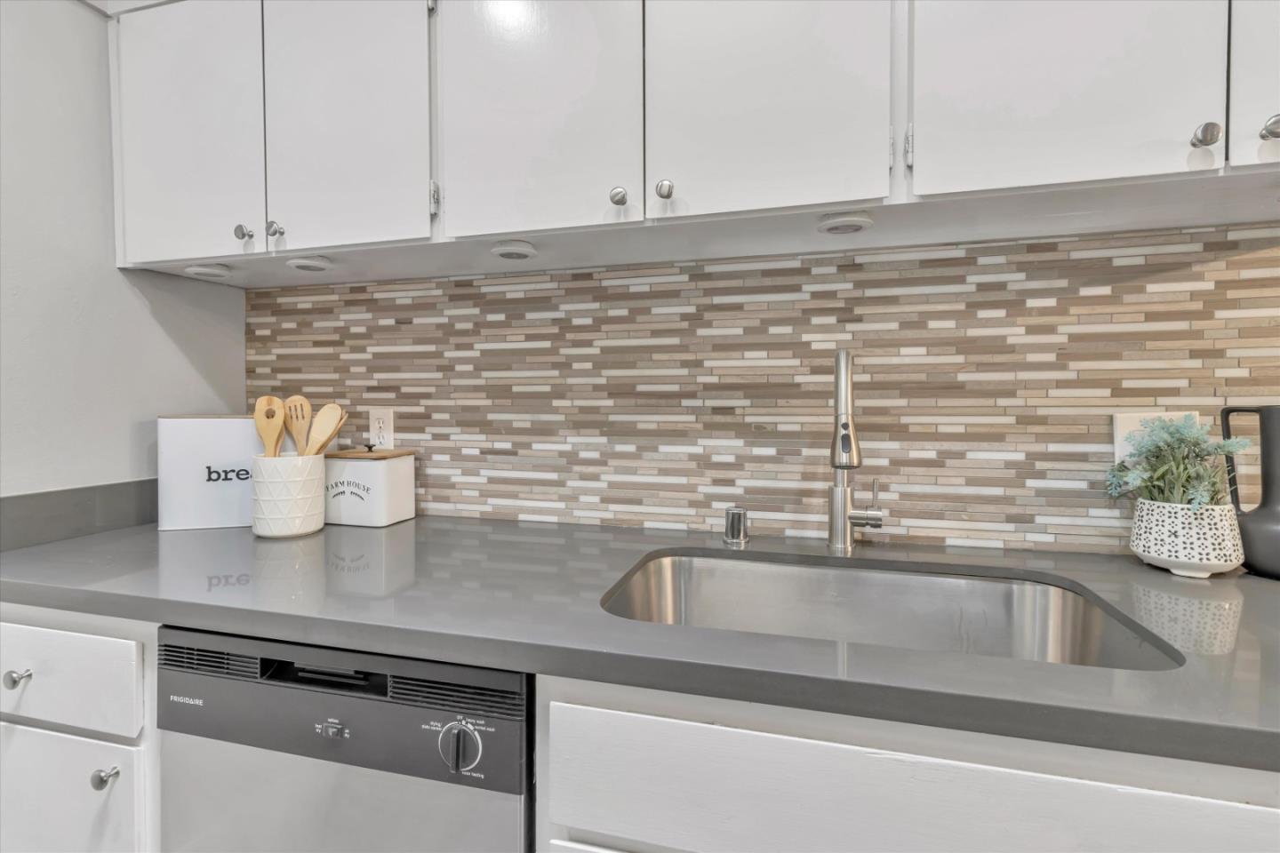 500 West Middlefield Road, Unit 100 Mountain View, CA 94043 - Photo 14 of 47 a close view of a sink and dishwasher