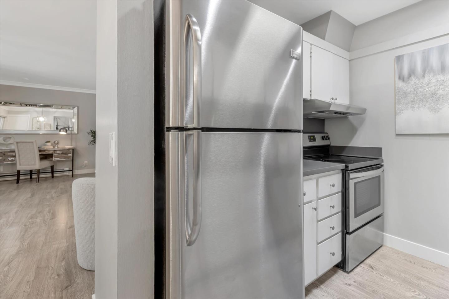 500 West Middlefield Road, Unit 100 Mountain View, CA 94043 - Photo 15 of 47 a kitchen with stainless steel appliances a refrigerator and a stove