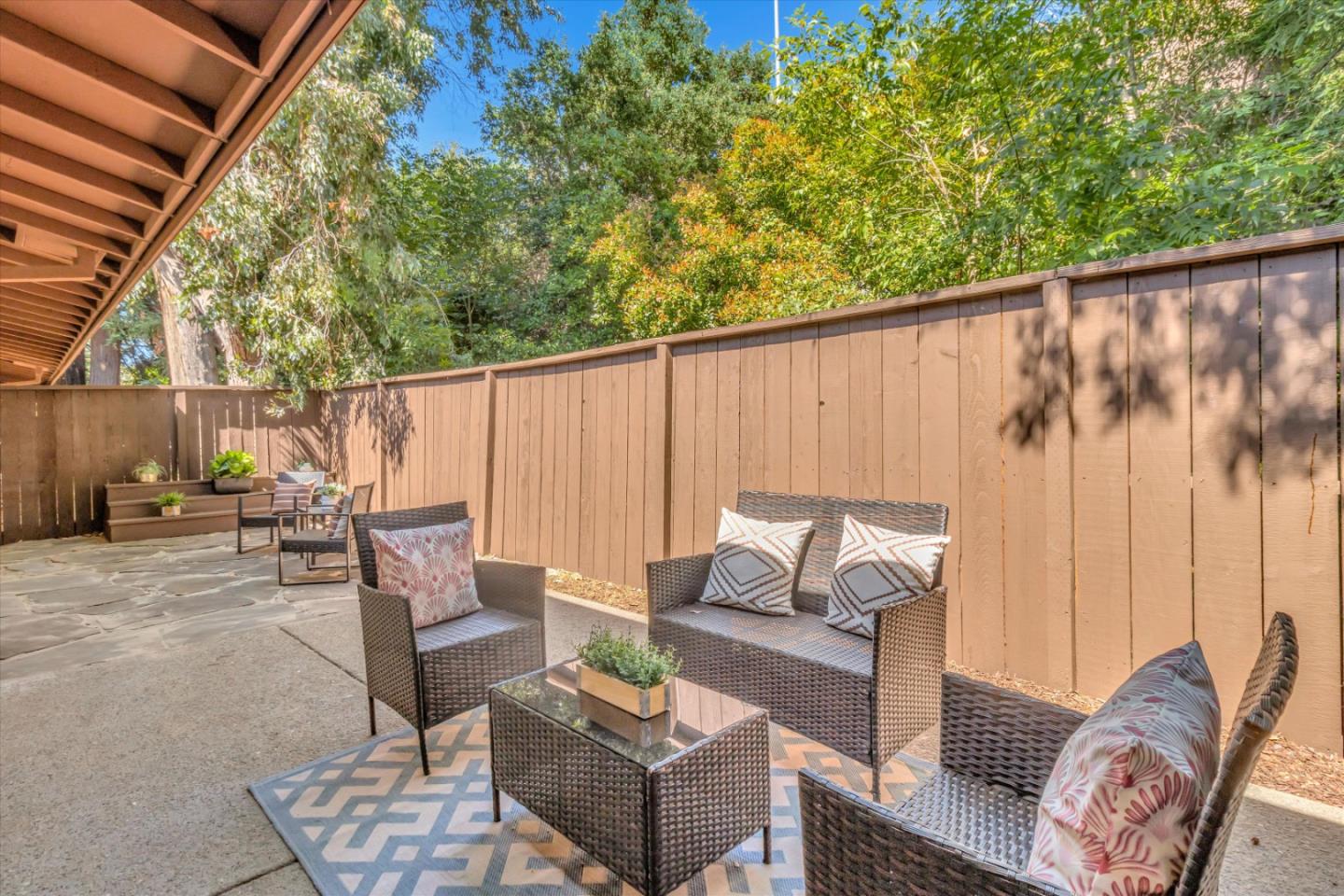 500 West Middlefield Road, Unit 100 Mountain View, CA 94043 - Photo 32 of 47 a outdoor living space with furniture and a couch