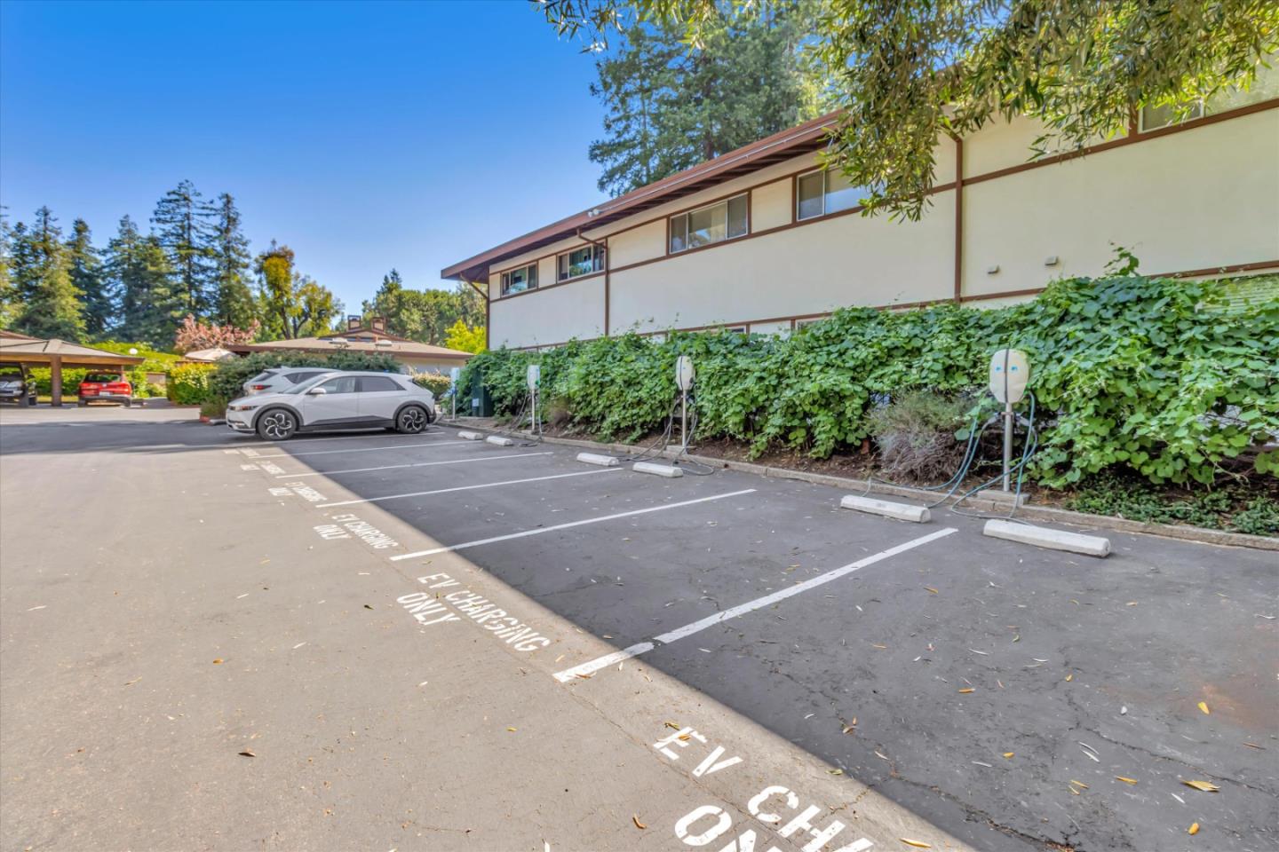 500 West Middlefield Road, Unit 100 Mountain View, CA 94043 - Photo 34 of 47 a couple of cars parked in front of a house