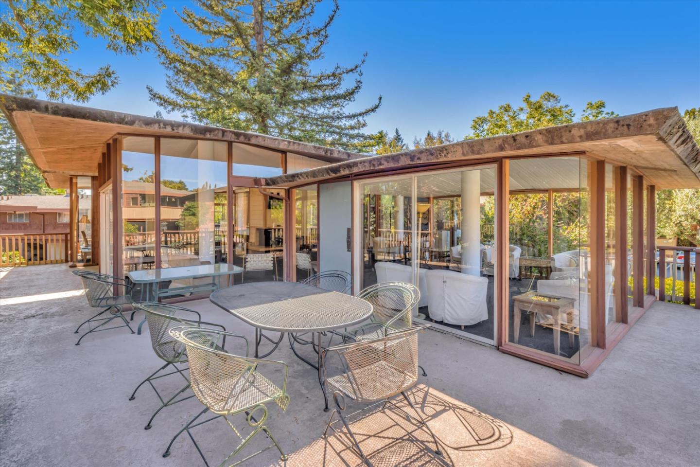 500 West Middlefield Road, Unit 100 Mountain View, CA 94043 - Photo 41 of 47 a dining room with furniture water view and a floor to ceiling window