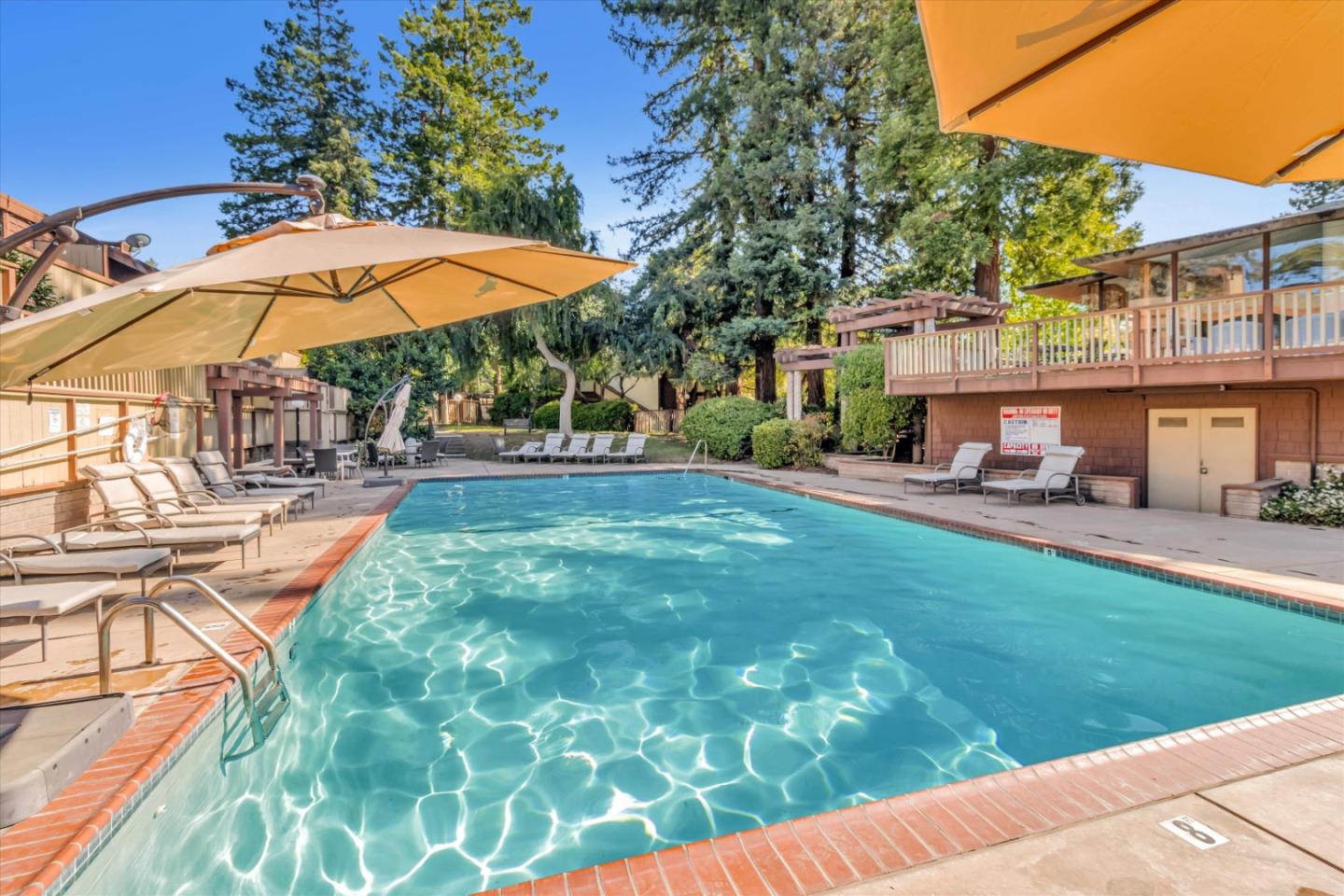 500 West Middlefield Road, Unit 100 Mountain View, CA 94043 - Photo 42 of 47 a view of a backyard with a patio and fire pit