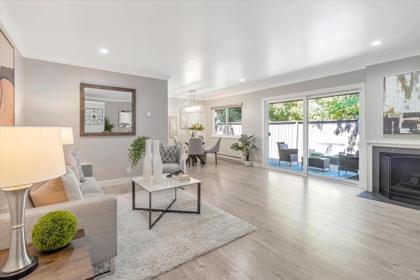 500 West Middlefield Road, Unit 100 Mountain View, CA 94043 - Photo 6 of 47 a living room with furniture and a fireplace