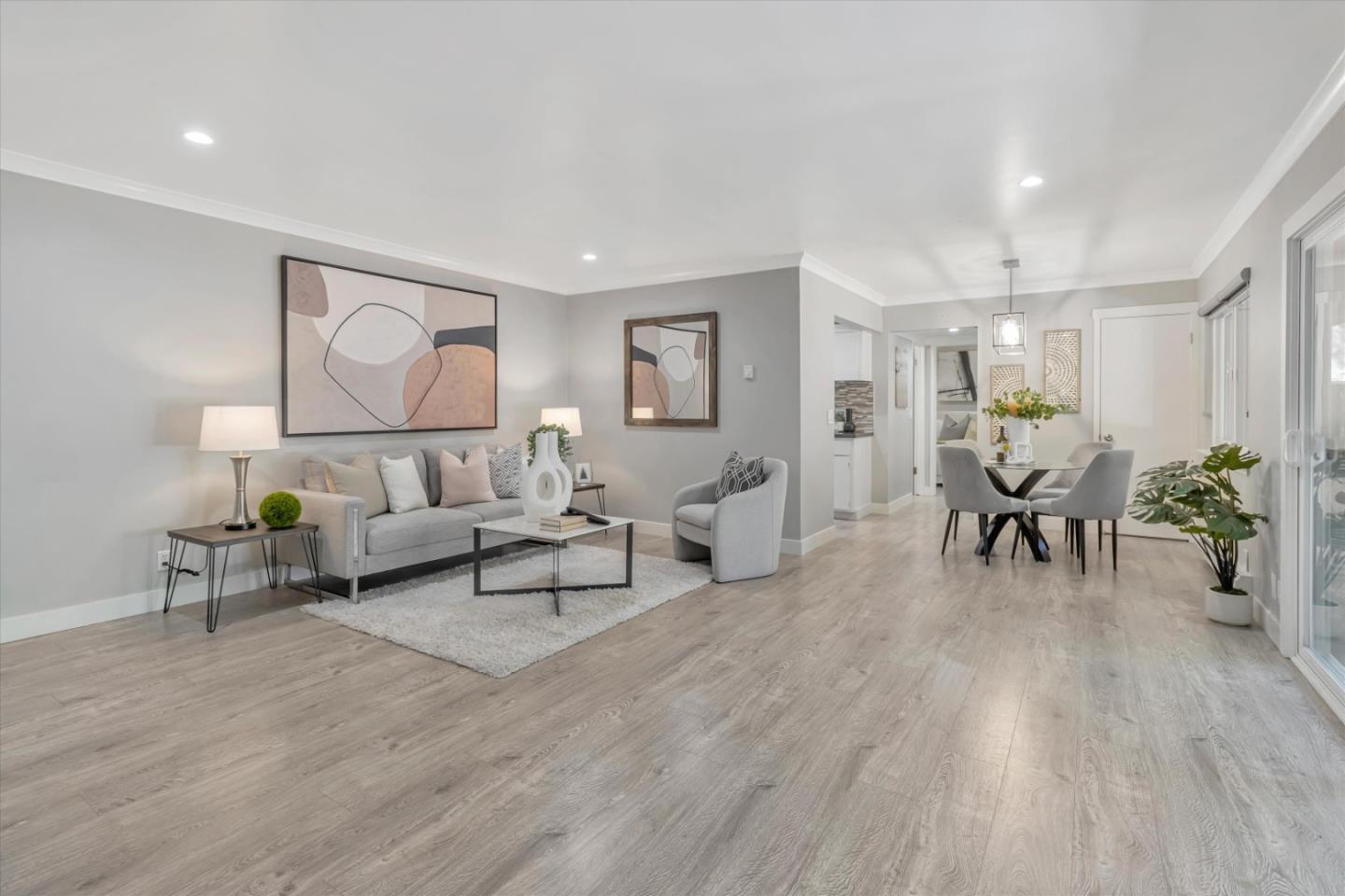 500 West Middlefield Road, Unit 100 Mountain View, CA 94043 - Photo 7 of 47 a living room with furniture and wooden floor