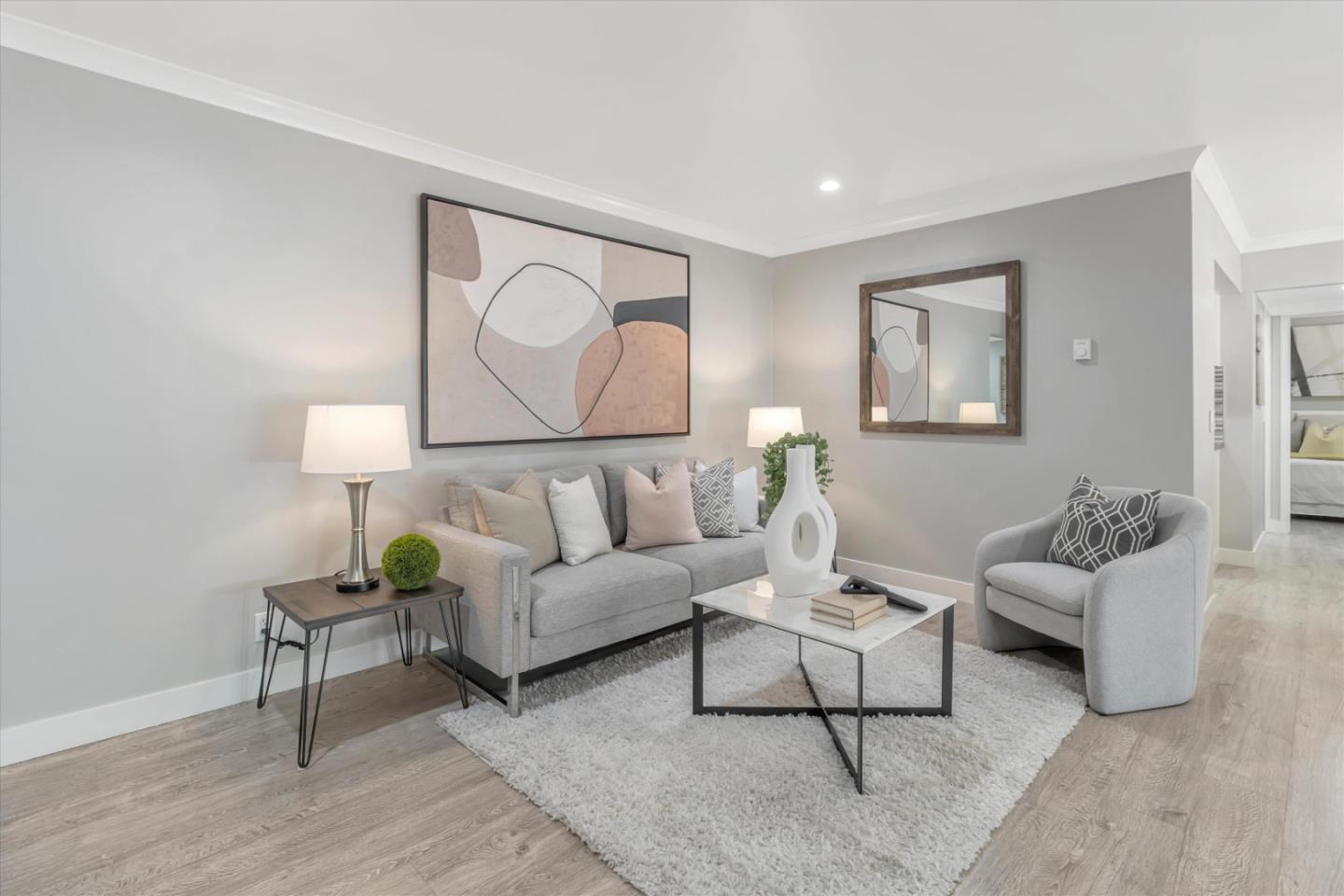 500 West Middlefield Road, Unit 100 Mountain View, CA 94043 - Photo 10 of 47 a living room with furniture and a lamp