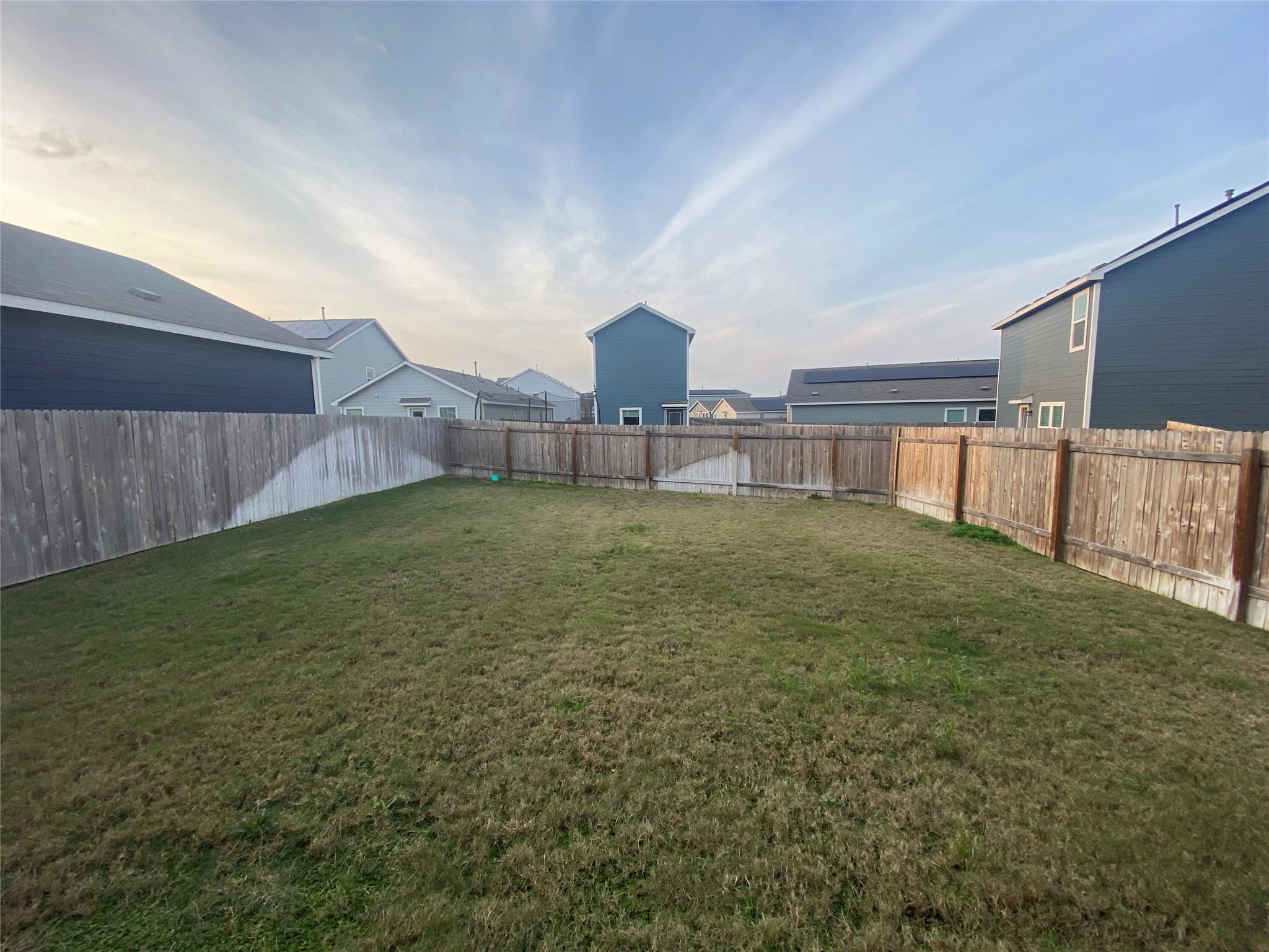 385 Amber Glen Maxwell, TX 78656 - Photo 8 of 8 a view of a backyard