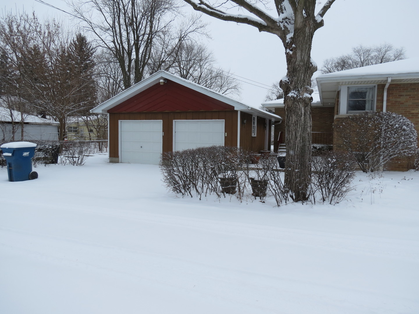 120 East 6th Street Momence, IL 60954 - Photo 6 of 26 a view of house covered with snow in front of house