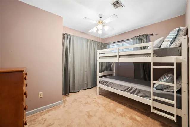 workspace with wooden floor and ceiling fan
