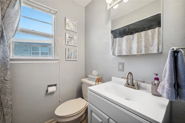 a bathroom with a sink and a toilet