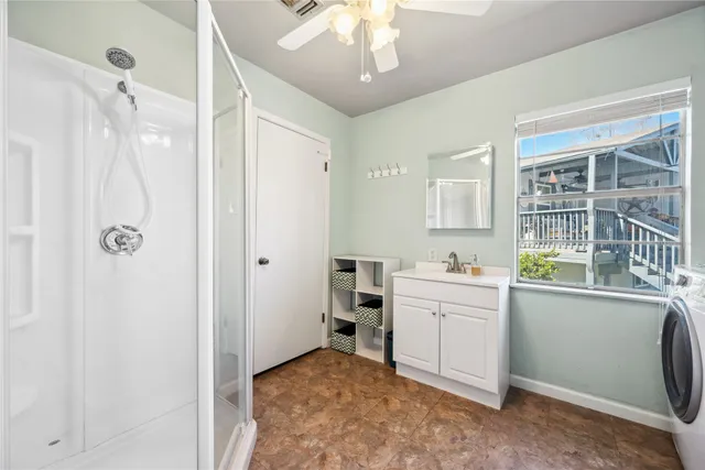 a kitchen with a refrigerator and a sink