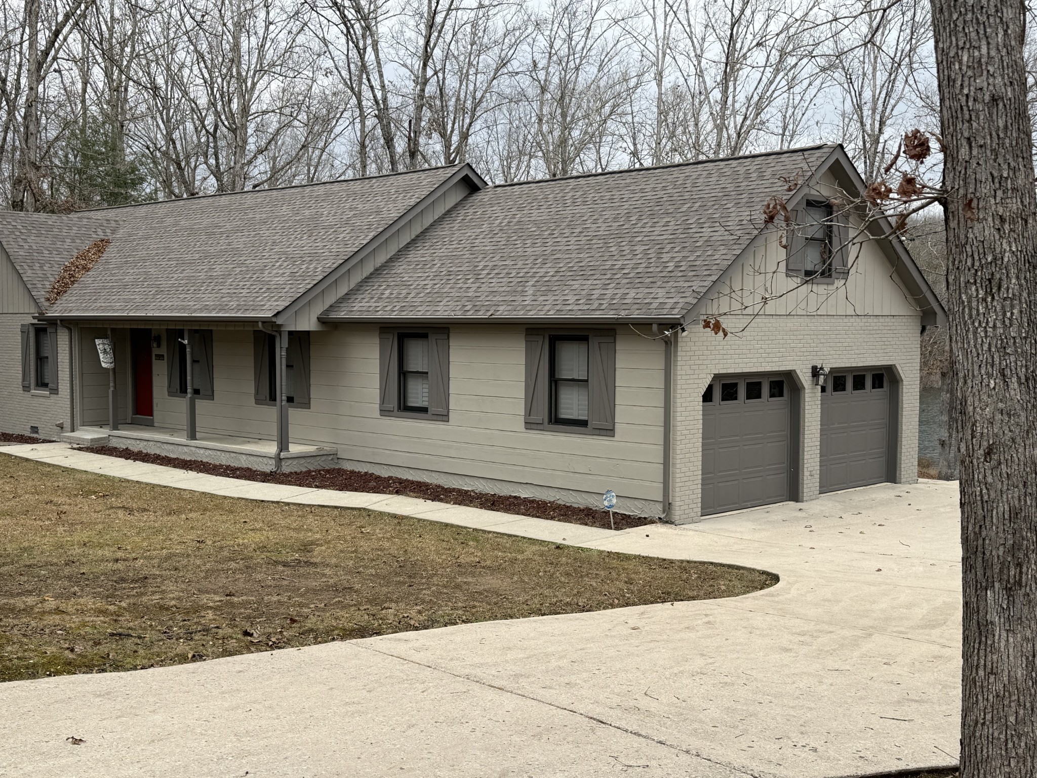 a front view of a house with a yard