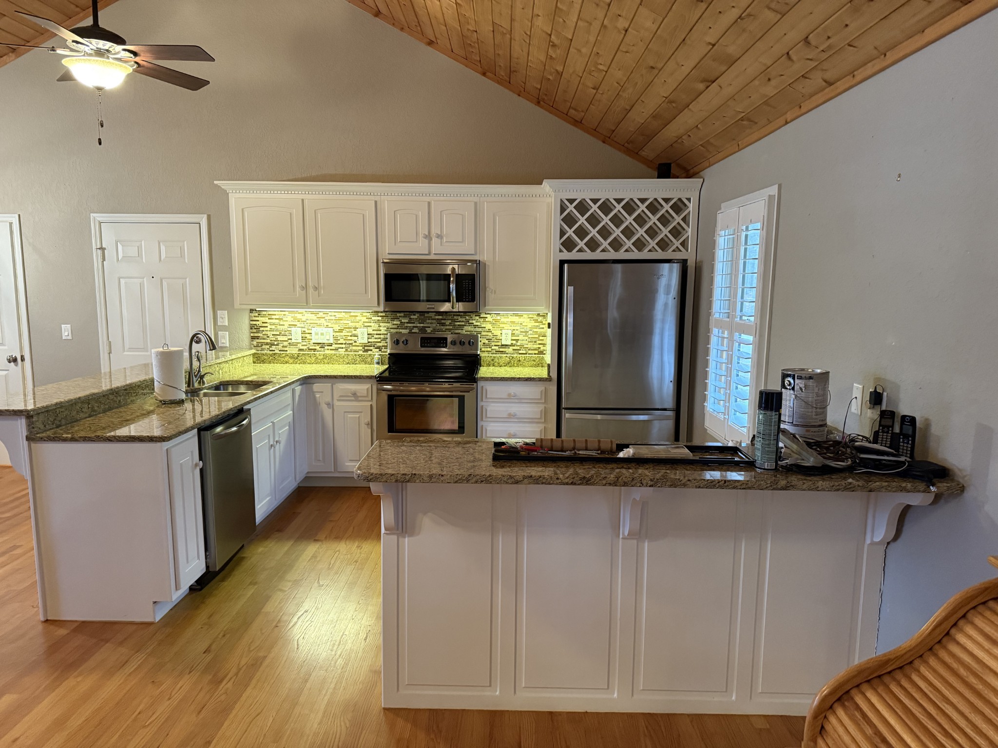 107 Chickory Lane Monteagle, TN 37356 - Photo 12 of 34 a kitchen with stainless steel appliances granite countertop a sink a stove top oven a counter space and cabinets