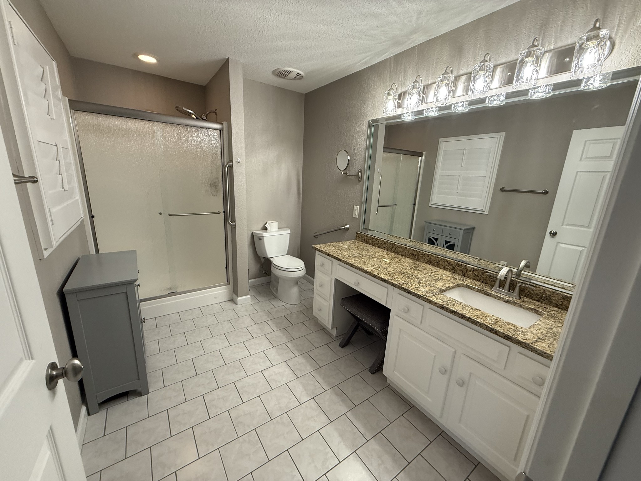 107 Chickory Lane Monteagle, TN 37356 - Photo 19 of 34 a bathroom with a sink a toilet and mirror