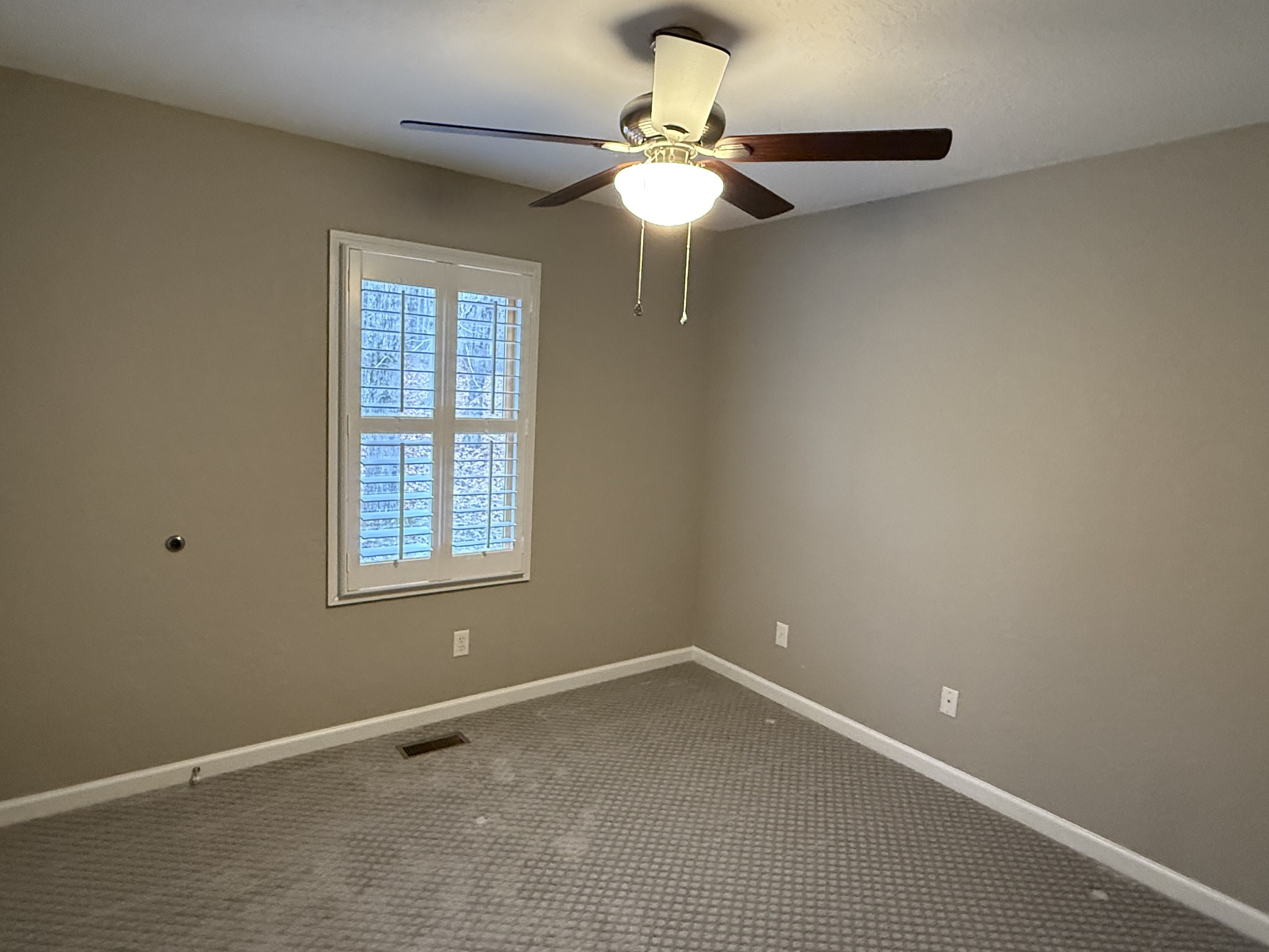 107 Chickory Lane Monteagle, TN 37356 - Photo 24 of 34 a view of an empty room with a window