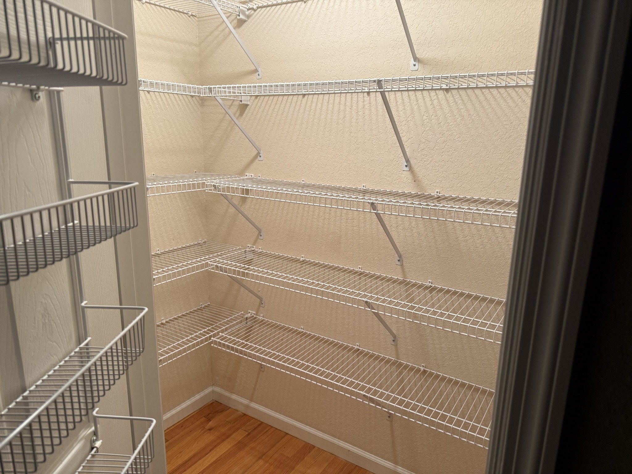 107 Chickory Lane Monteagle, TN 37356 - Photo 30 of 34 a view of walk in closet with wooden floor