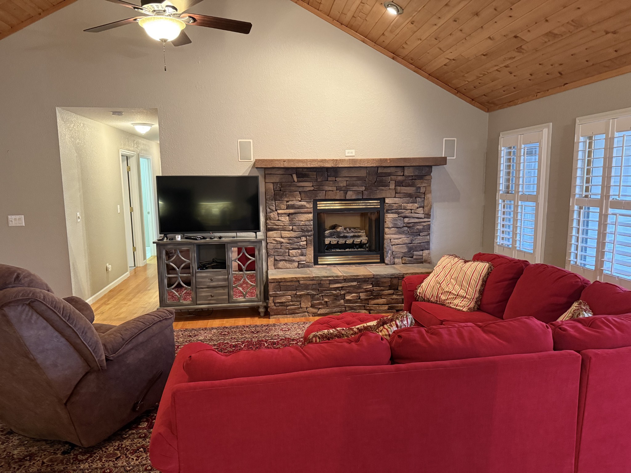 107 Chickory Lane Monteagle, TN 37356 - Photo 9 of 34 a living room with furniture and a flat screen tv