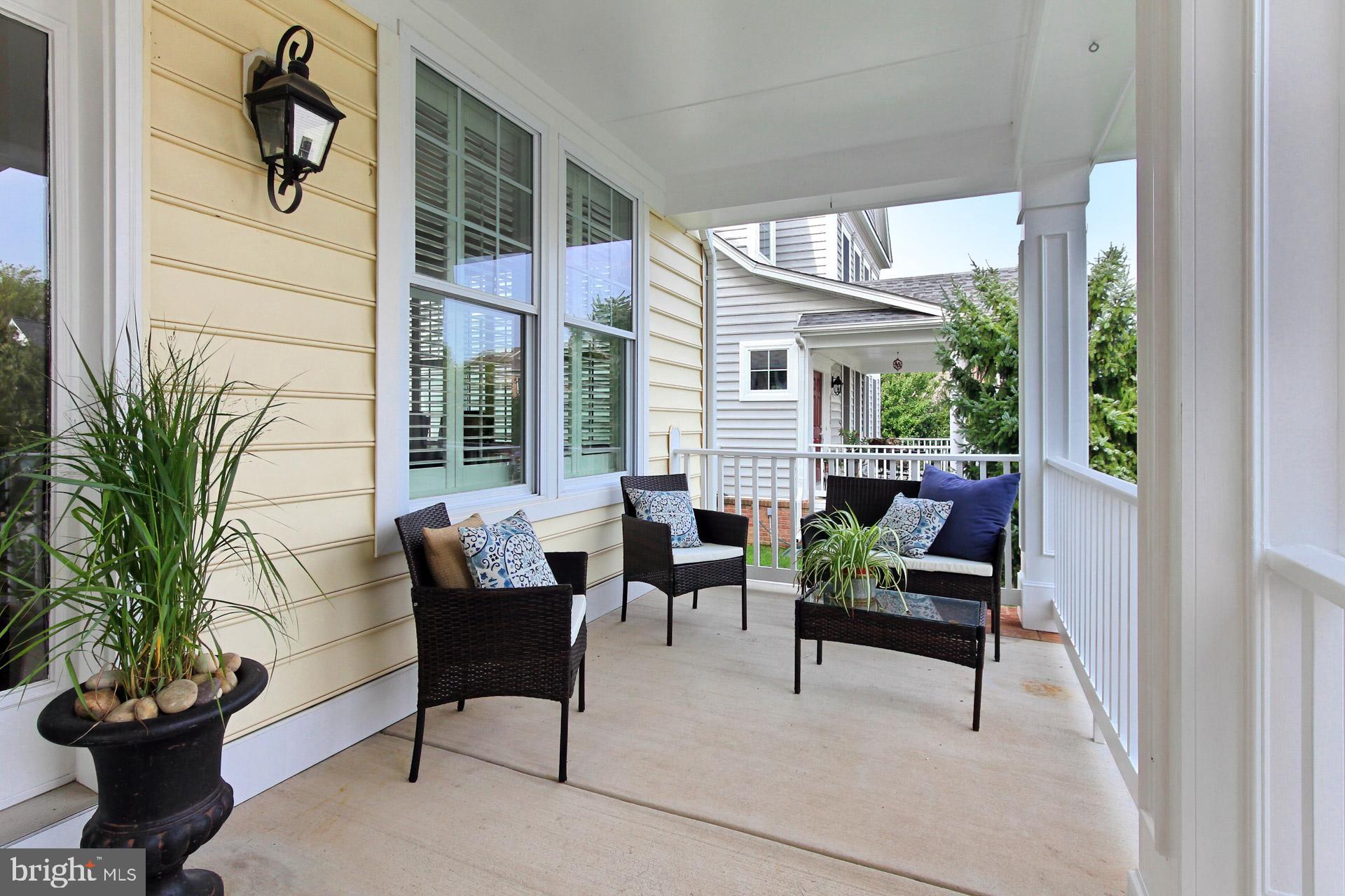 42441 Spring Splendor Drive Brambleton, VA 20148 - Photo 4 of 50 Look How Spacious This Front Porch Is!!