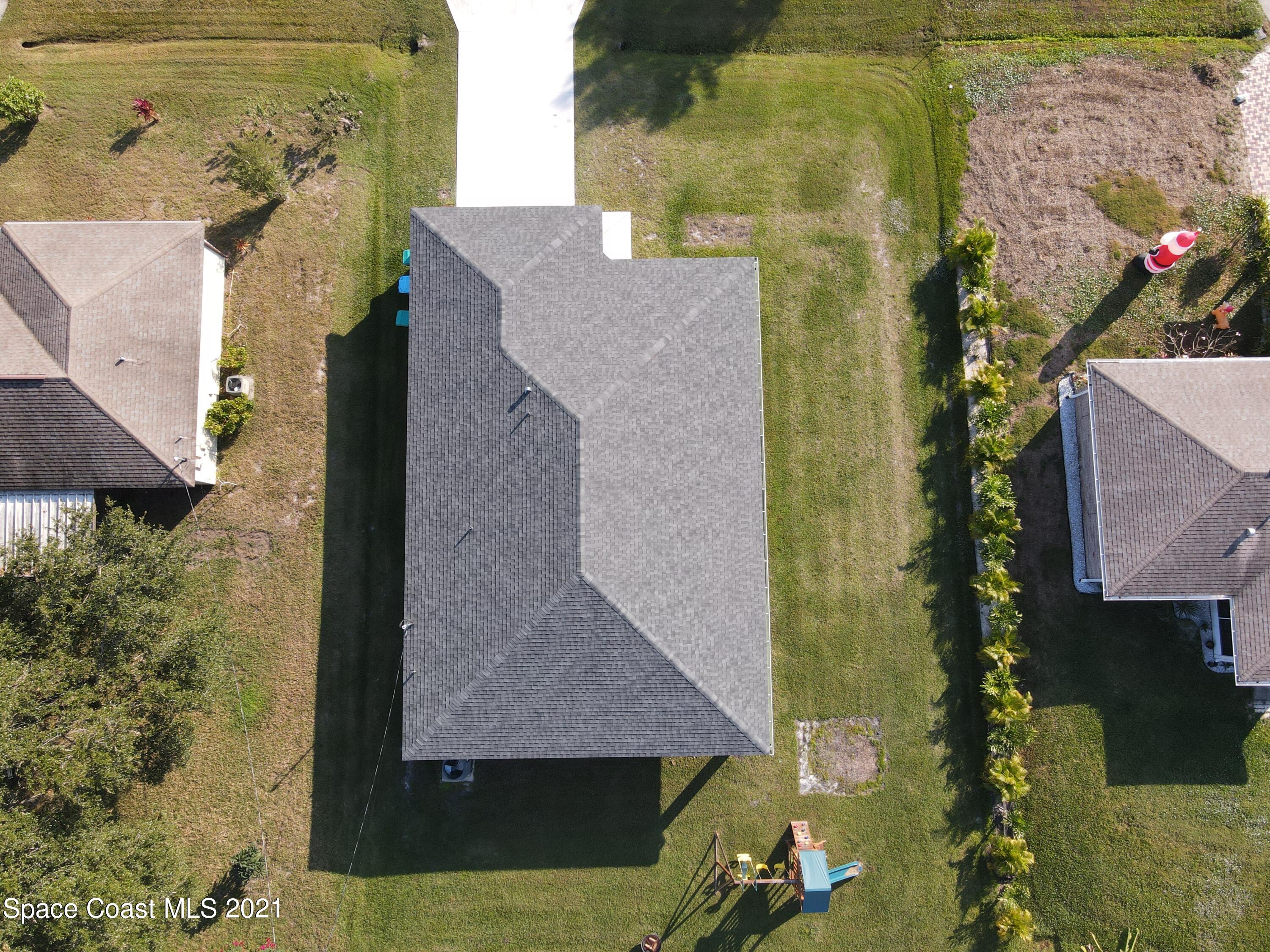 1525 Talbott Street Palm Bay, FL 32909 - Photo 3 of 31 an aerial view of a house