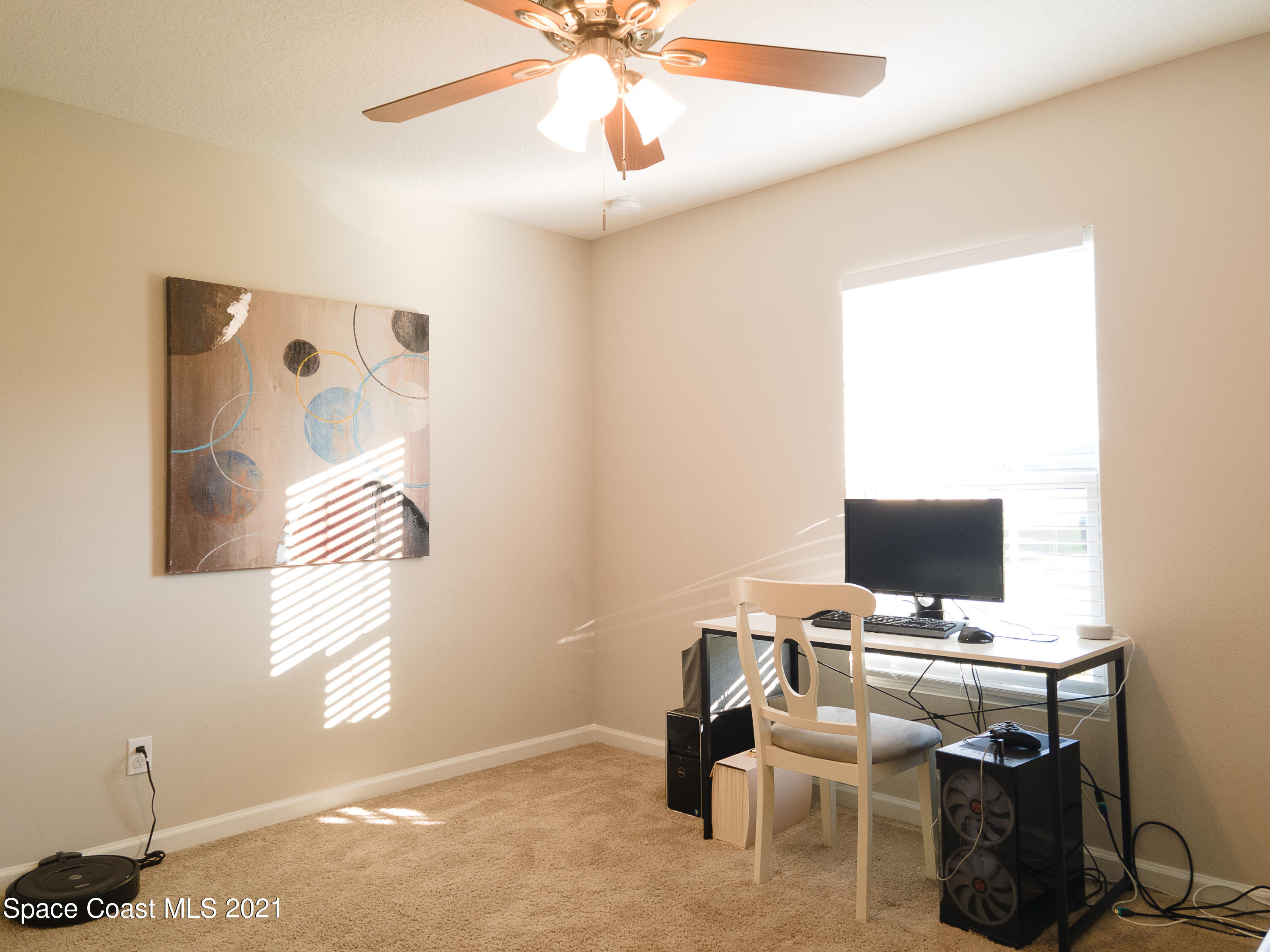 1525 Talbott Street Palm Bay, FL 32909 - Photo 6 of 31 a view of workspace with fan