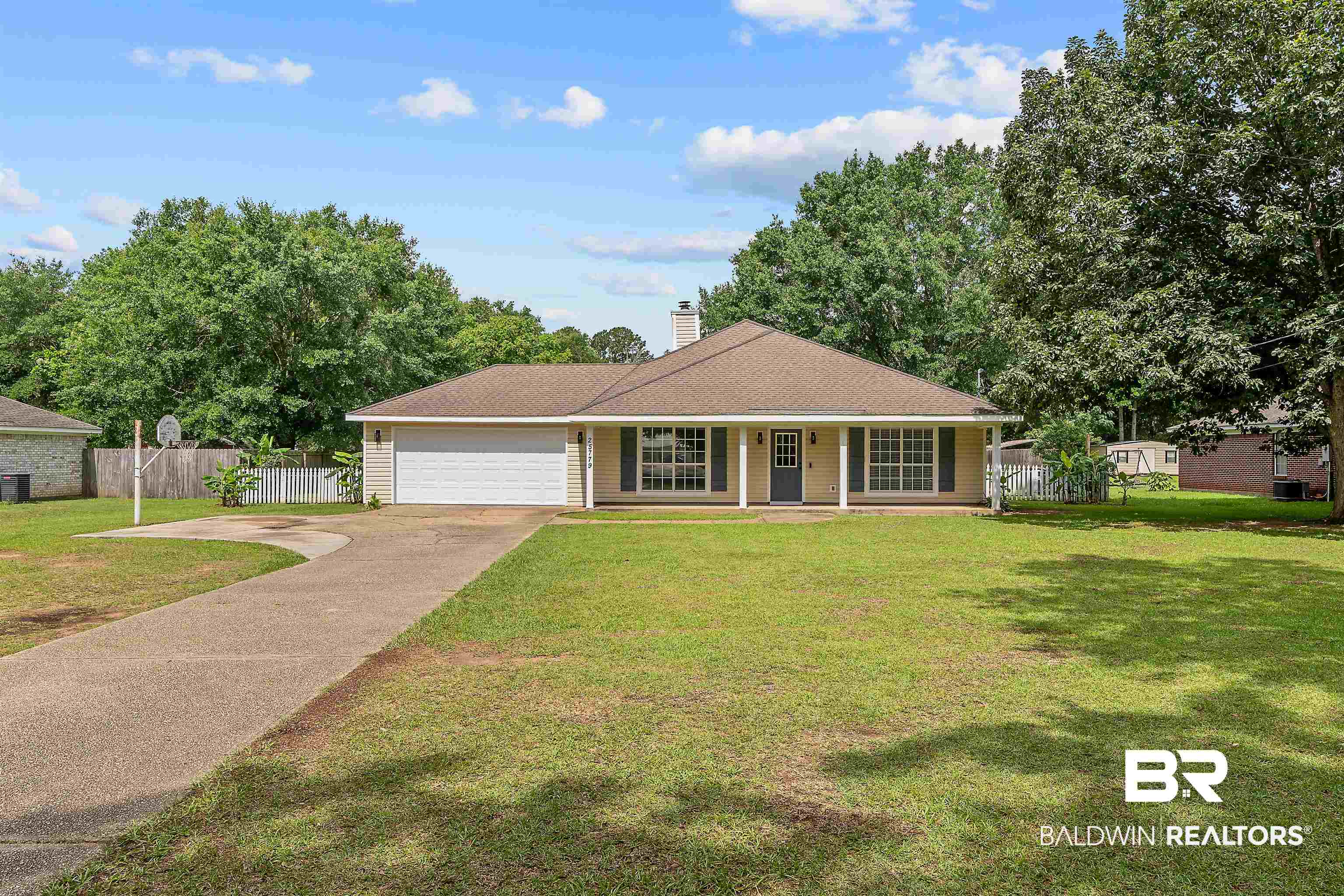25779 Austin Road Daphne, AL 36526 - Photo 5 of 30 Single story home with an attached garage, covered porch, driveway, and a chimney