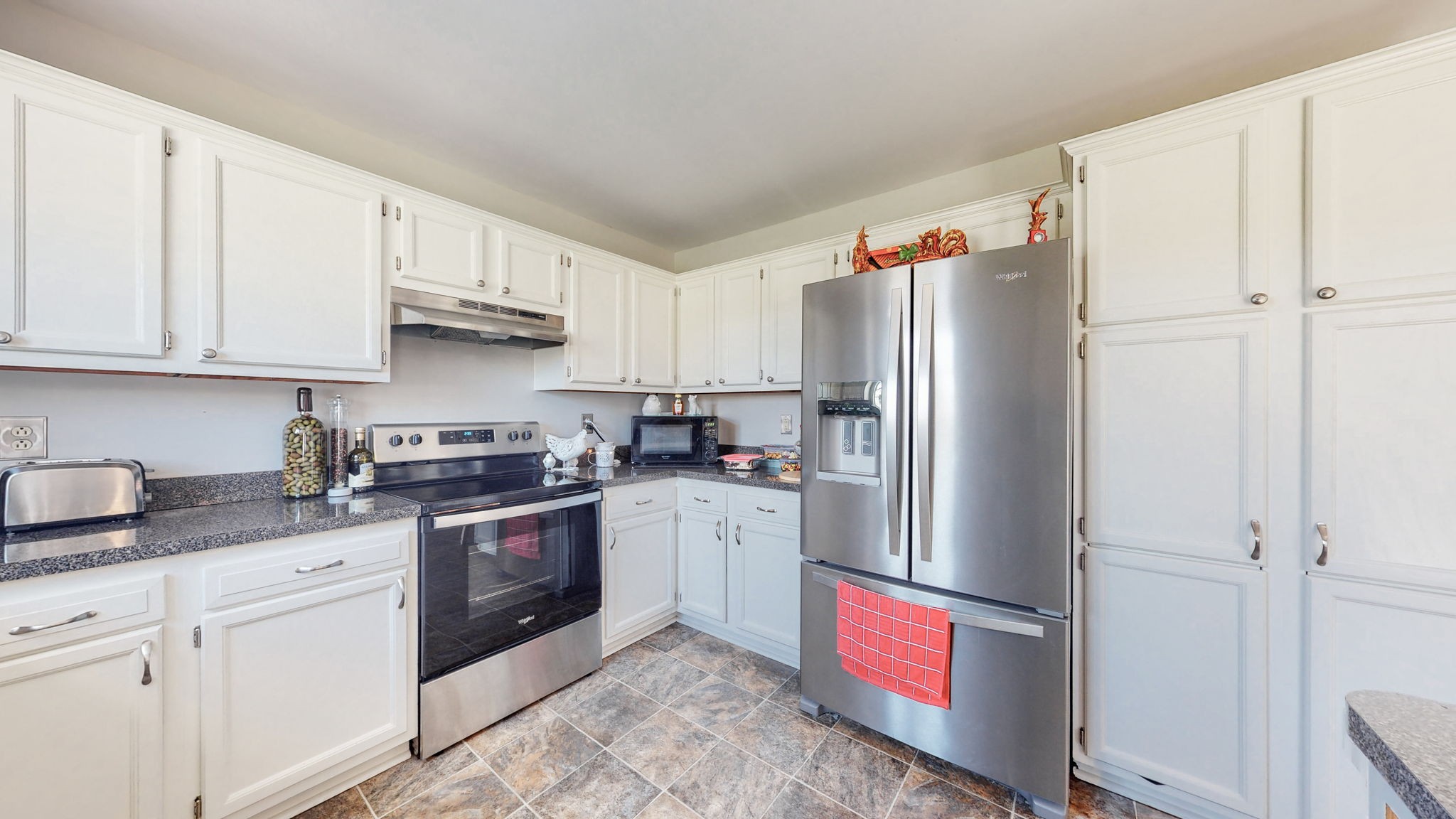 4211 Sandy Springs Road Springfield, TN 37172 - Photo 11 of 58 a kitchen with stainless steel appliances granite countertop a refrigerator sink and stove