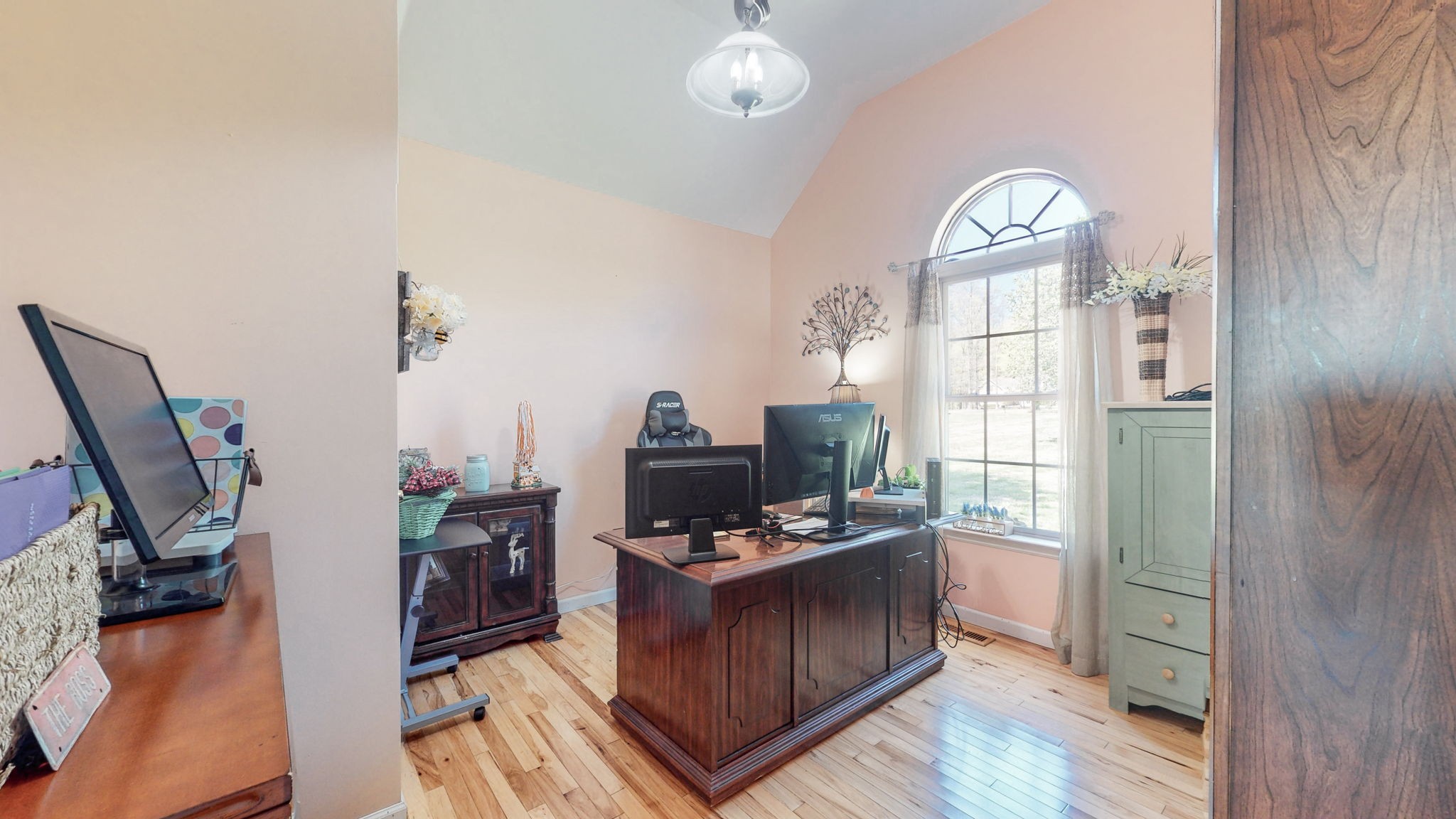 4211 Sandy Springs Road Springfield, TN 37172 - Photo 14 of 58 a view of a workspace with furniture and a window