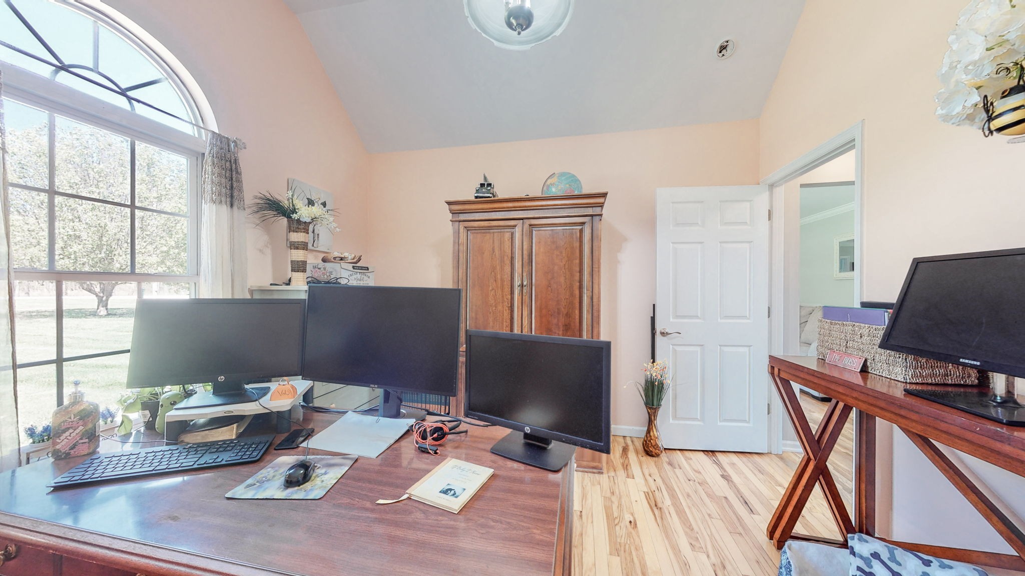 4211 Sandy Springs Road Springfield, TN 37172 - Photo 16 of 58 a view of workspace with wooden floor windows cabinet and chair