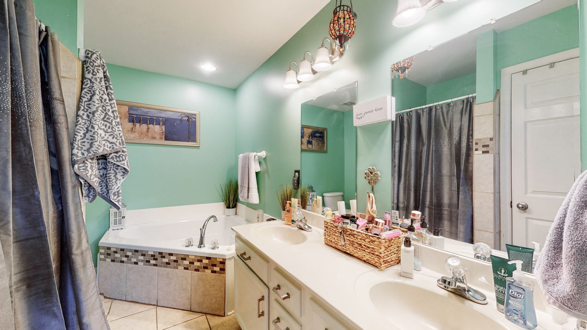 4211 Sandy Springs Road Springfield, TN 37172 - Photo 24 of 58 a bathroom with a granite countertop sink and a mirror