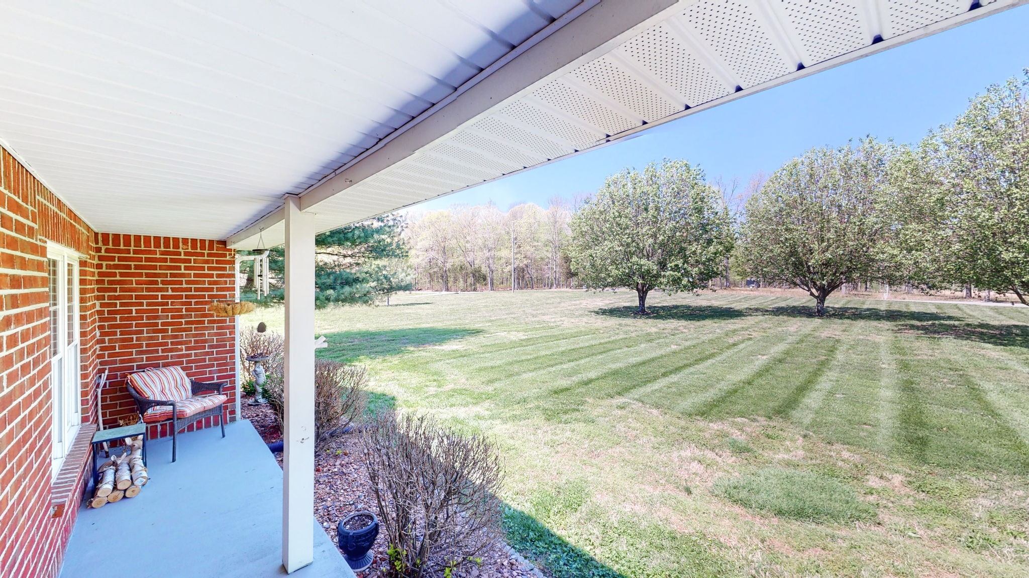 4211 Sandy Springs Road Springfield, TN 37172 - Photo 28 of 58 a swimming pool with lawn chairs and large tree