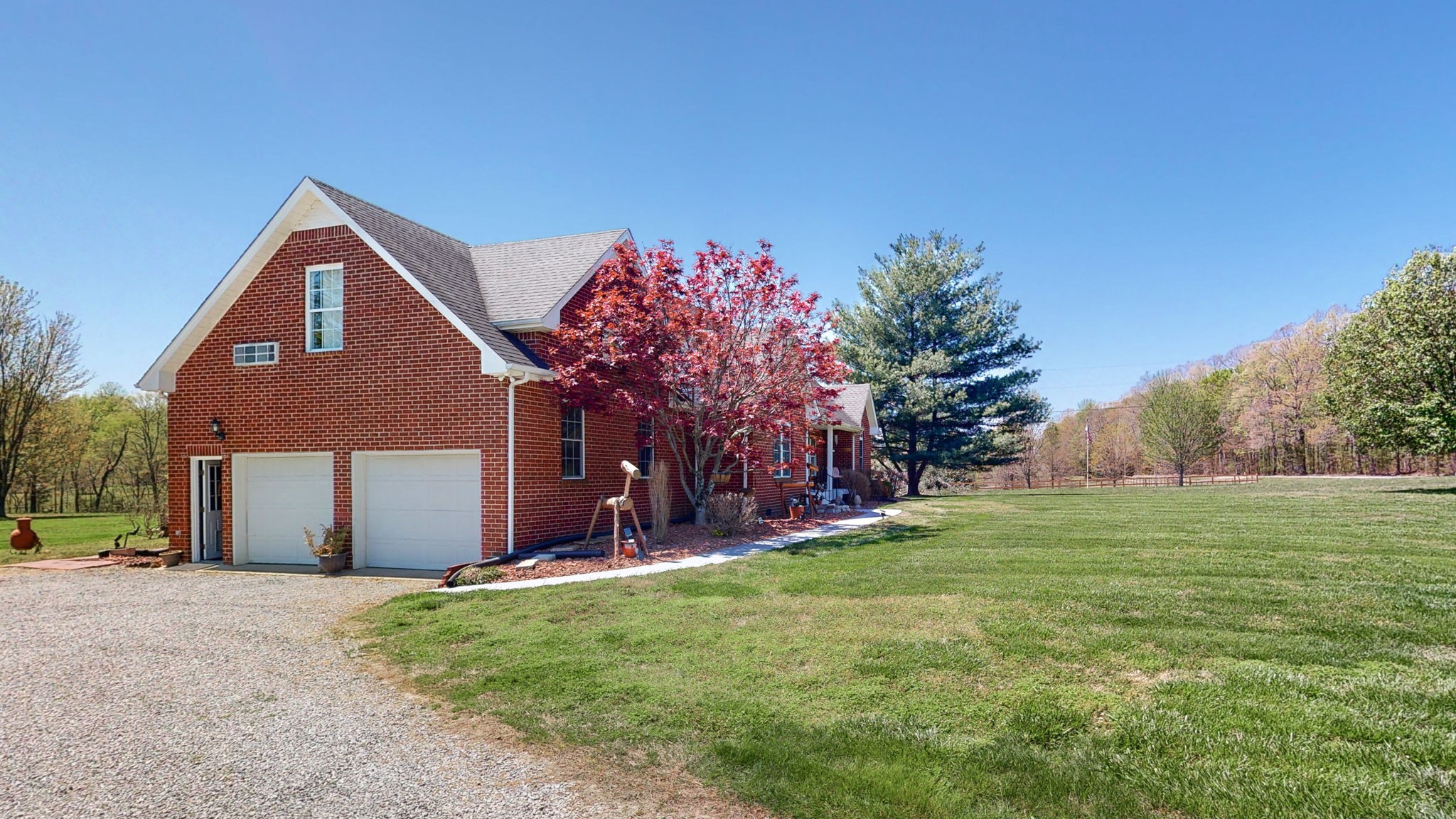 4211 Sandy Springs Road Springfield, TN 37172 - Photo 34 of 58 a front view of a house with a yard and garage
