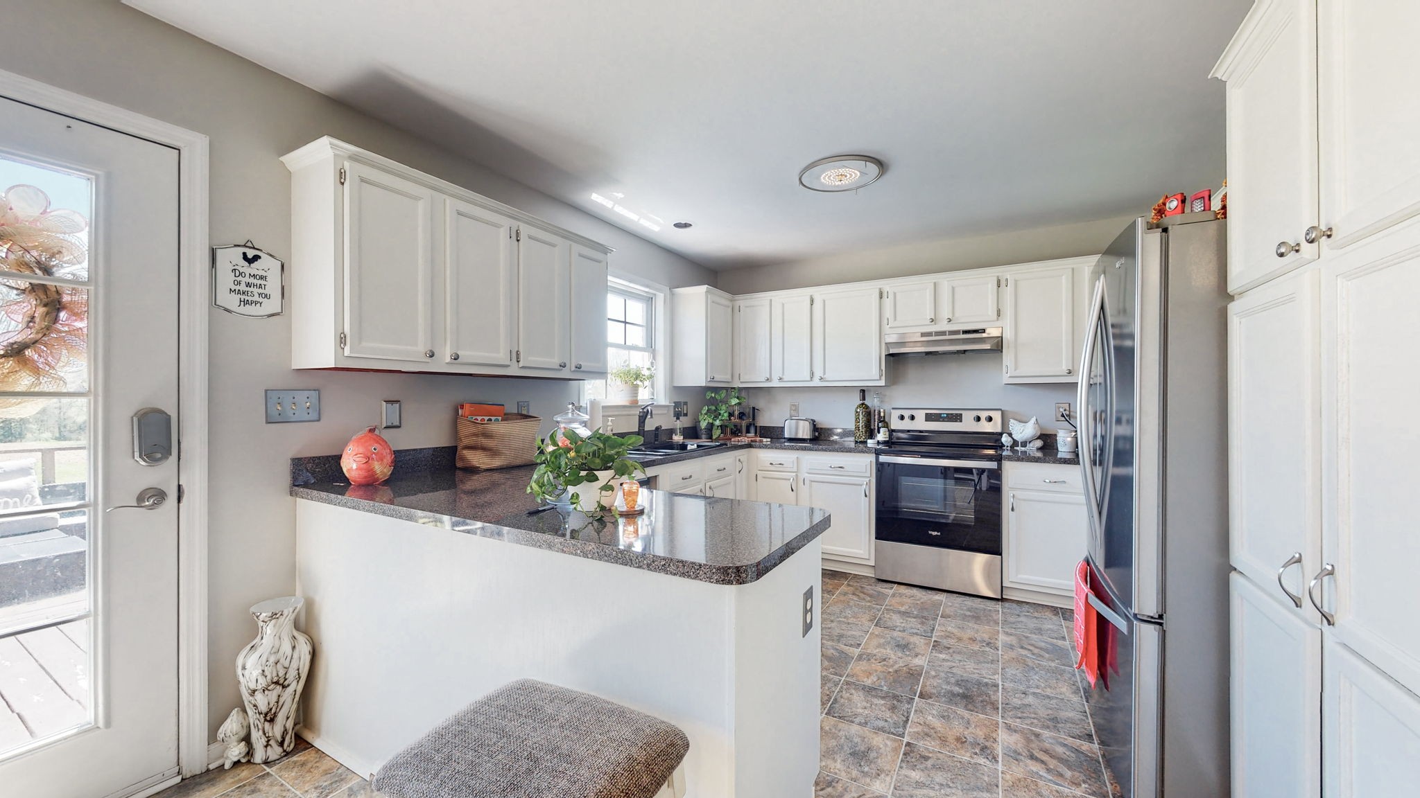 4211 Sandy Springs Road Springfield, TN 37172 - Photo 4 of 58 a kitchen with stainless steel appliances granite countertop a refrigerator sink and cabinets