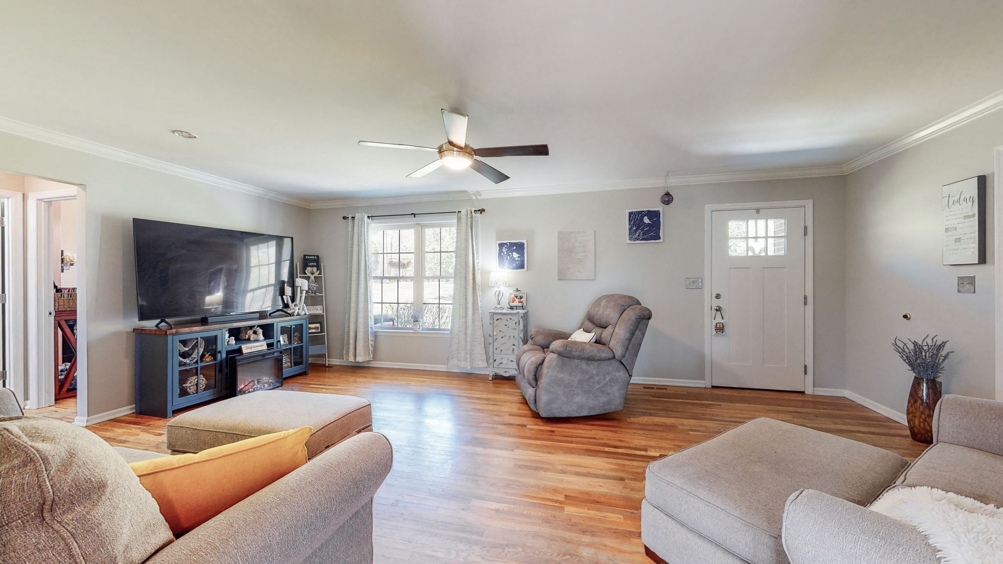 4211 Sandy Springs Road Springfield, TN 37172 - Photo 6 of 58 a living room with furniture and a flat screen tv