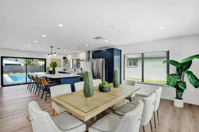 a terrace of a house with outdoor seating