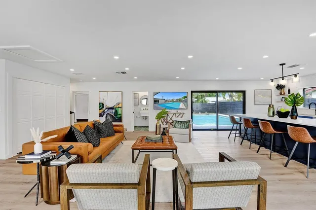 a view of a kitchen from a hallway