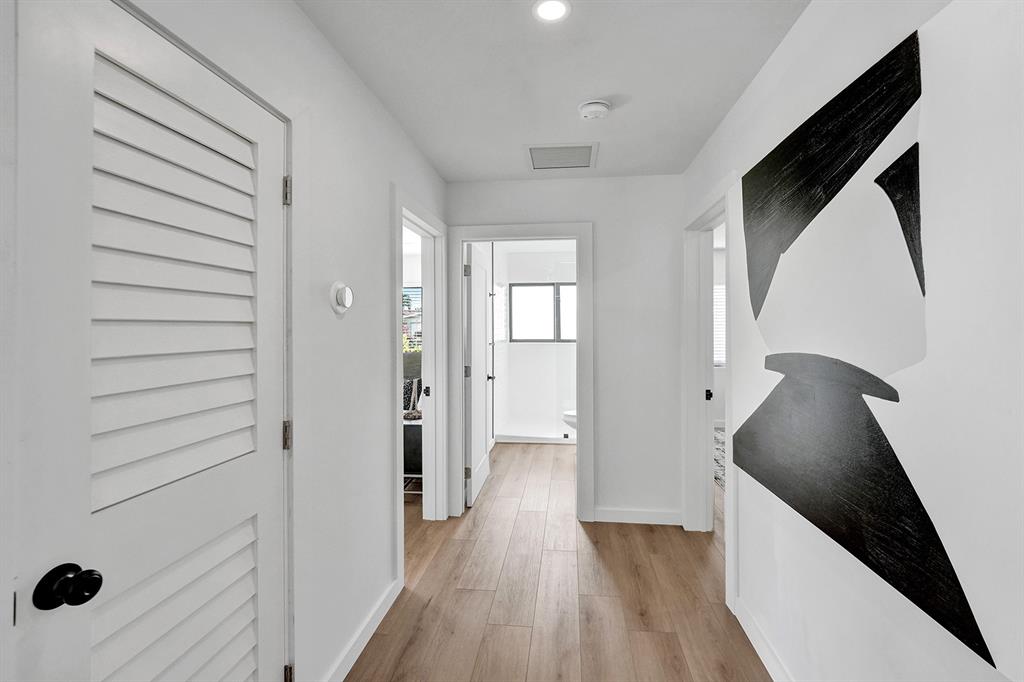 5501 Northeast 18th Terrace Fort Lauderdale, FL 33308 - Photo 31 of 56 a view of a kitchen from a hallway