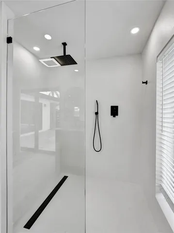 a view of an empty room with a hallway