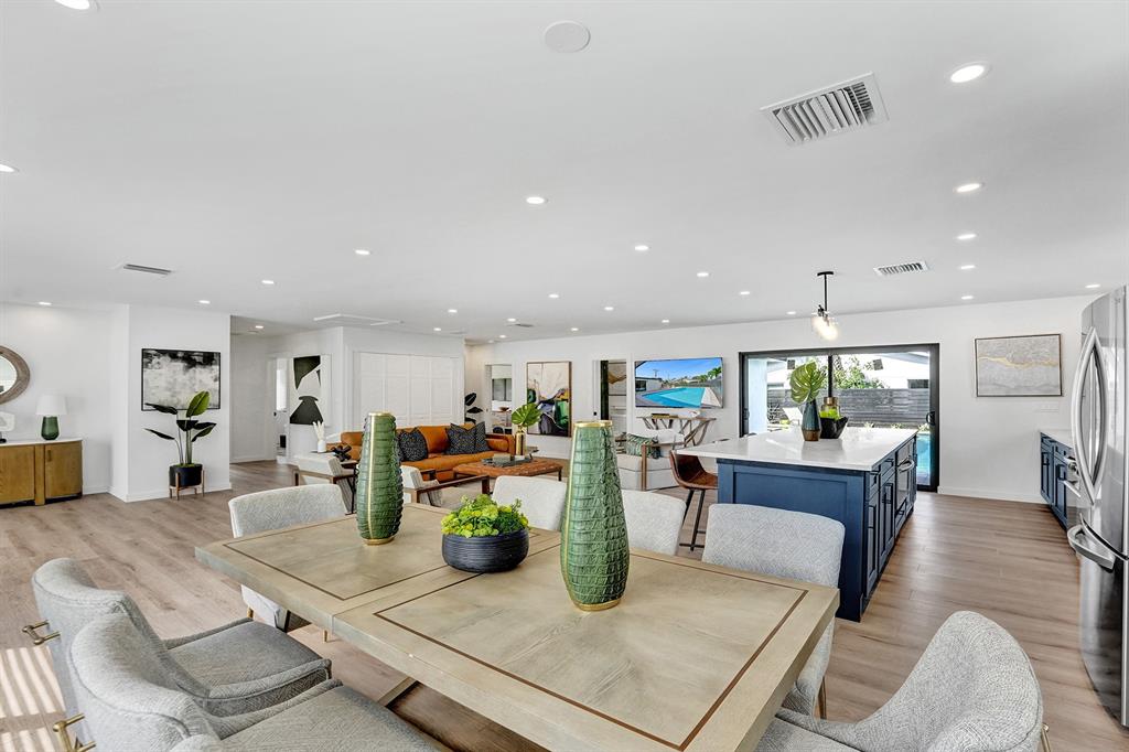 5501 Northeast 18th Terrace Fort Lauderdale, FL 33308 - Photo 41 of 56 a view of a dining room with furniture