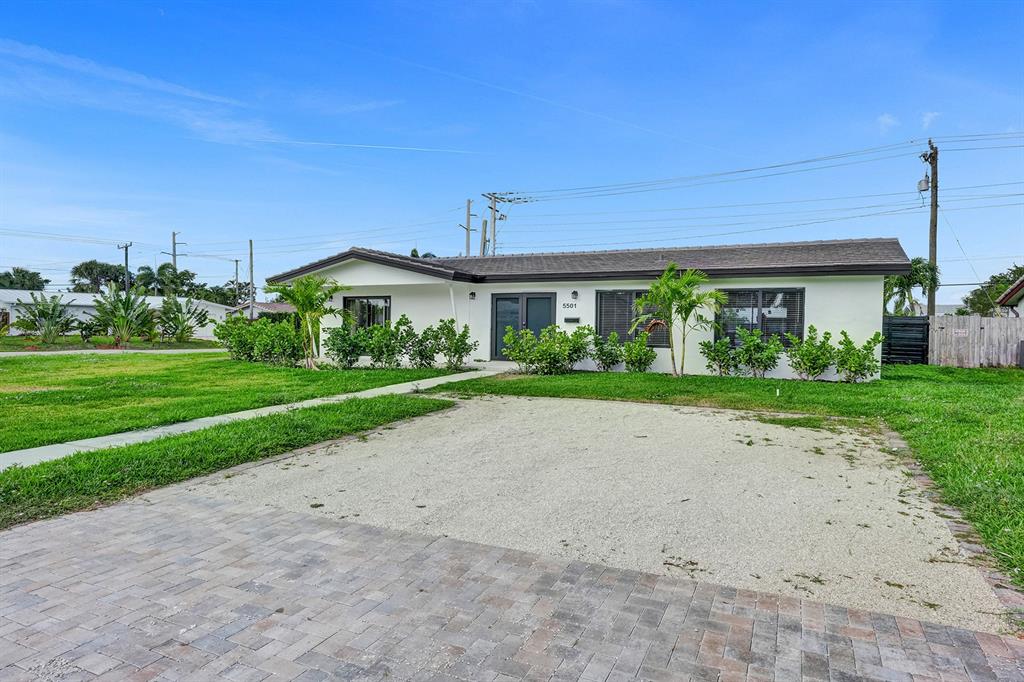 5501 Northeast 18th Terrace Fort Lauderdale, FL 33308 - Photo 45 of 56 a front view of house with garden