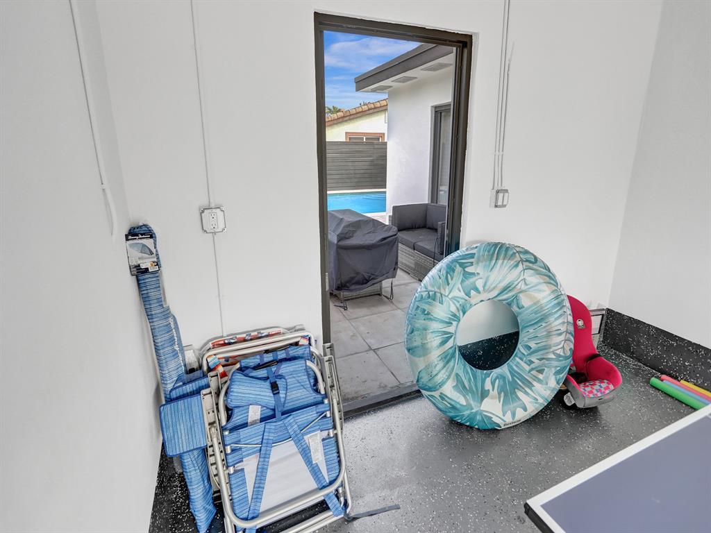 5501 Northeast 18th Terrace Fort Lauderdale, FL 33308 - Photo 46 of 56 a room with toys and a table