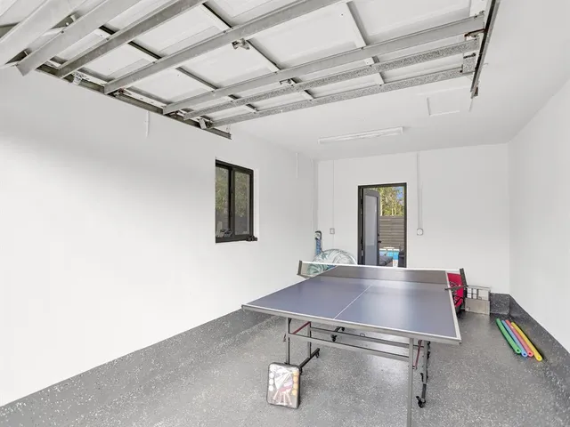 a view of swimming pool with outdoor seating