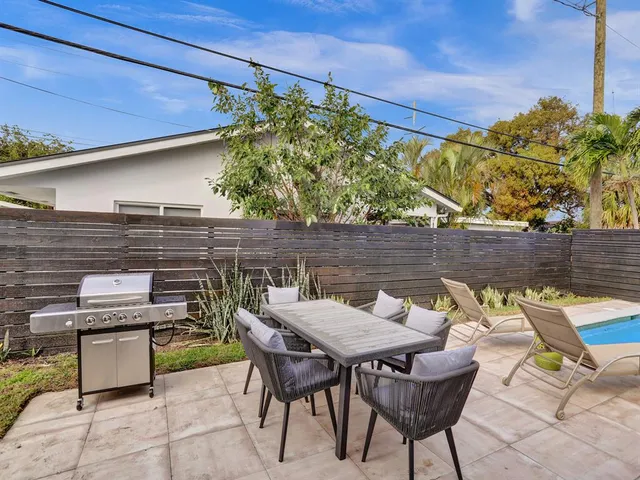 an outdoor space with furniture