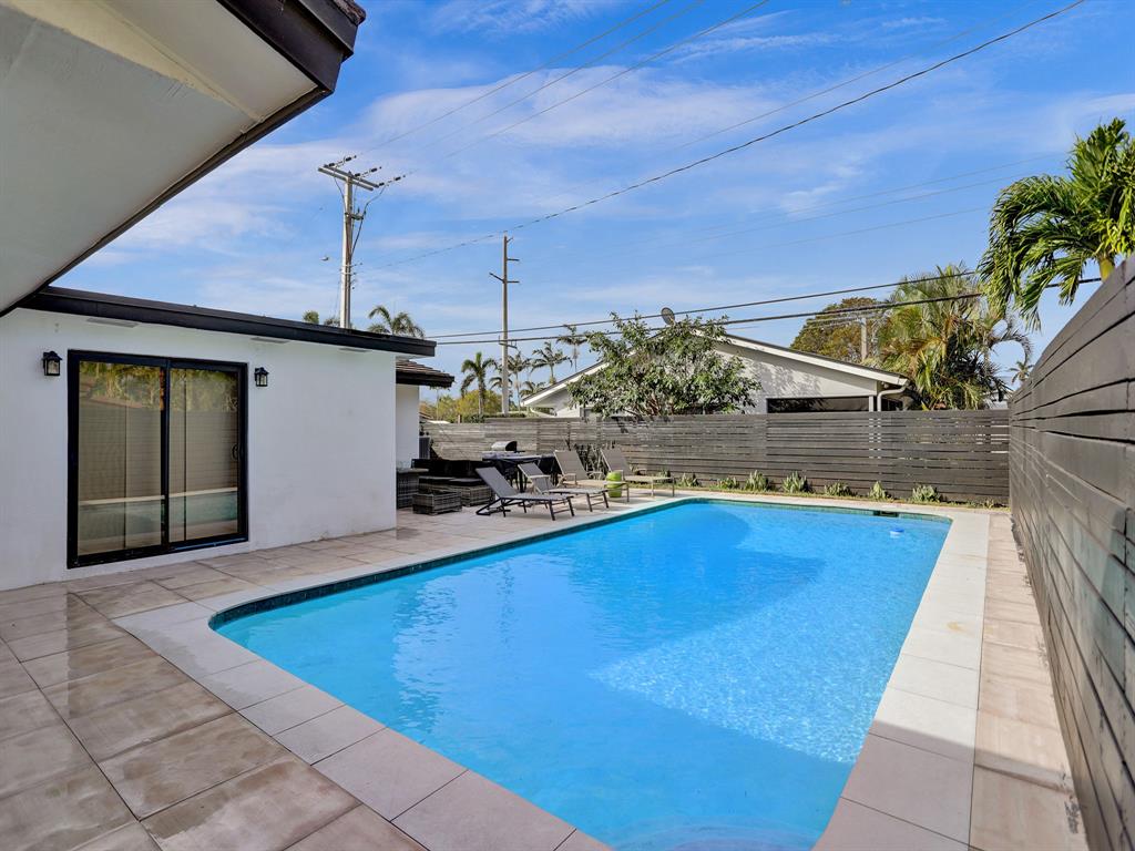 5501 Northeast 18th Terrace Fort Lauderdale, FL 33308 - Photo 51 of 56 a view of a backyard with swimming pool