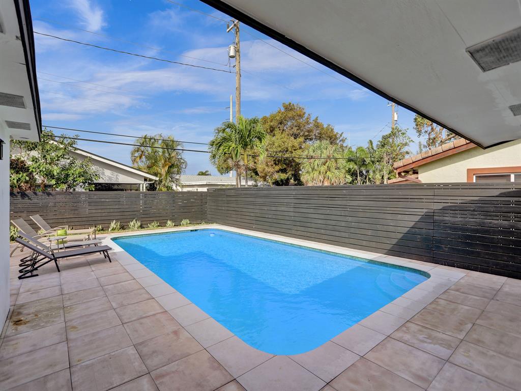 5501 Northeast 18th Terrace Fort Lauderdale, FL 33308 - Photo 52 of 56 a view of swimming pool with outdoor seating