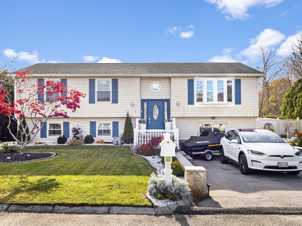 a view of a house with swimming pool and furniture