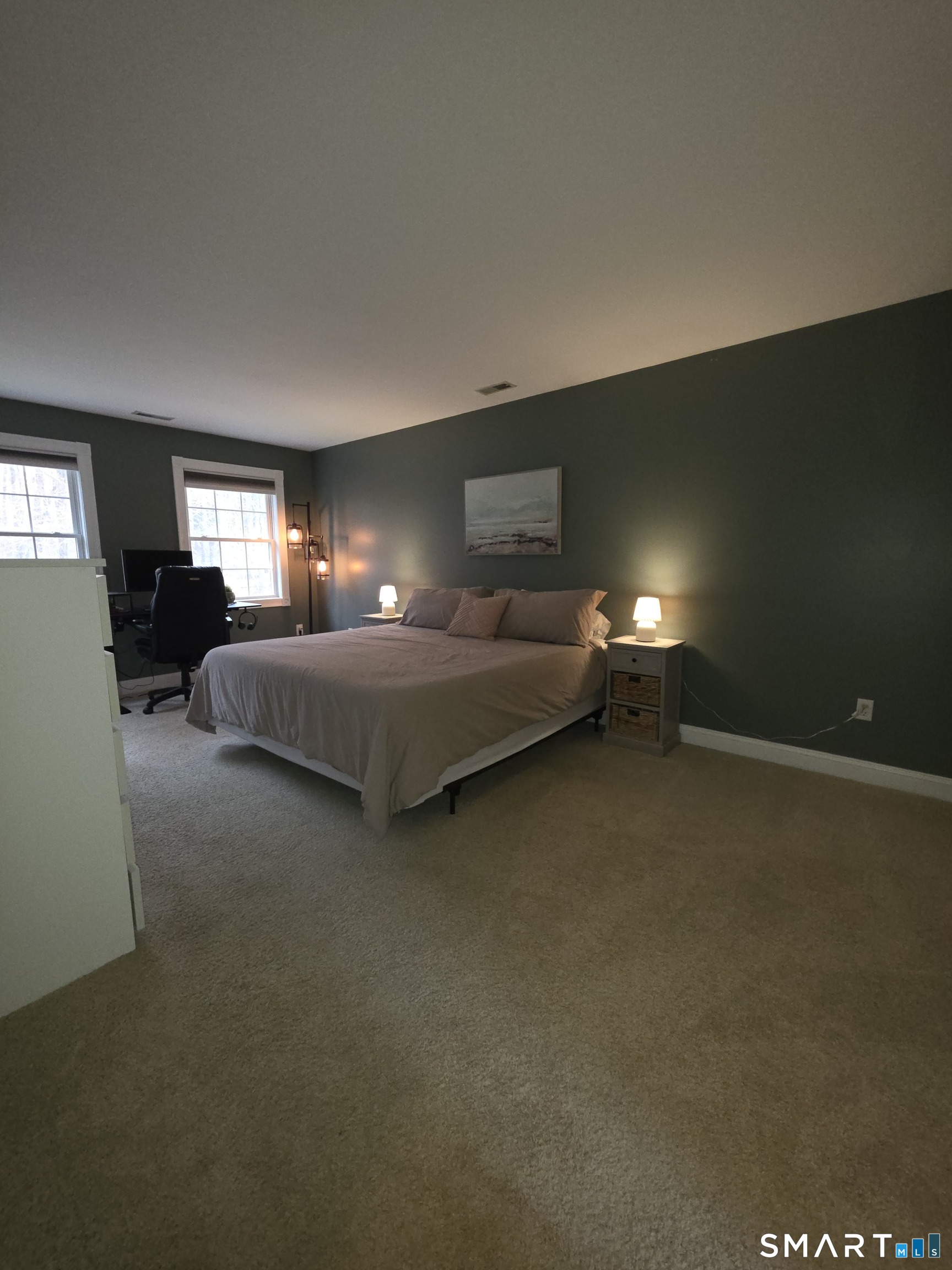 120 Woodbine Road Colchester, CT 06415 - Photo 14 of 24 a bedroom with bed and window