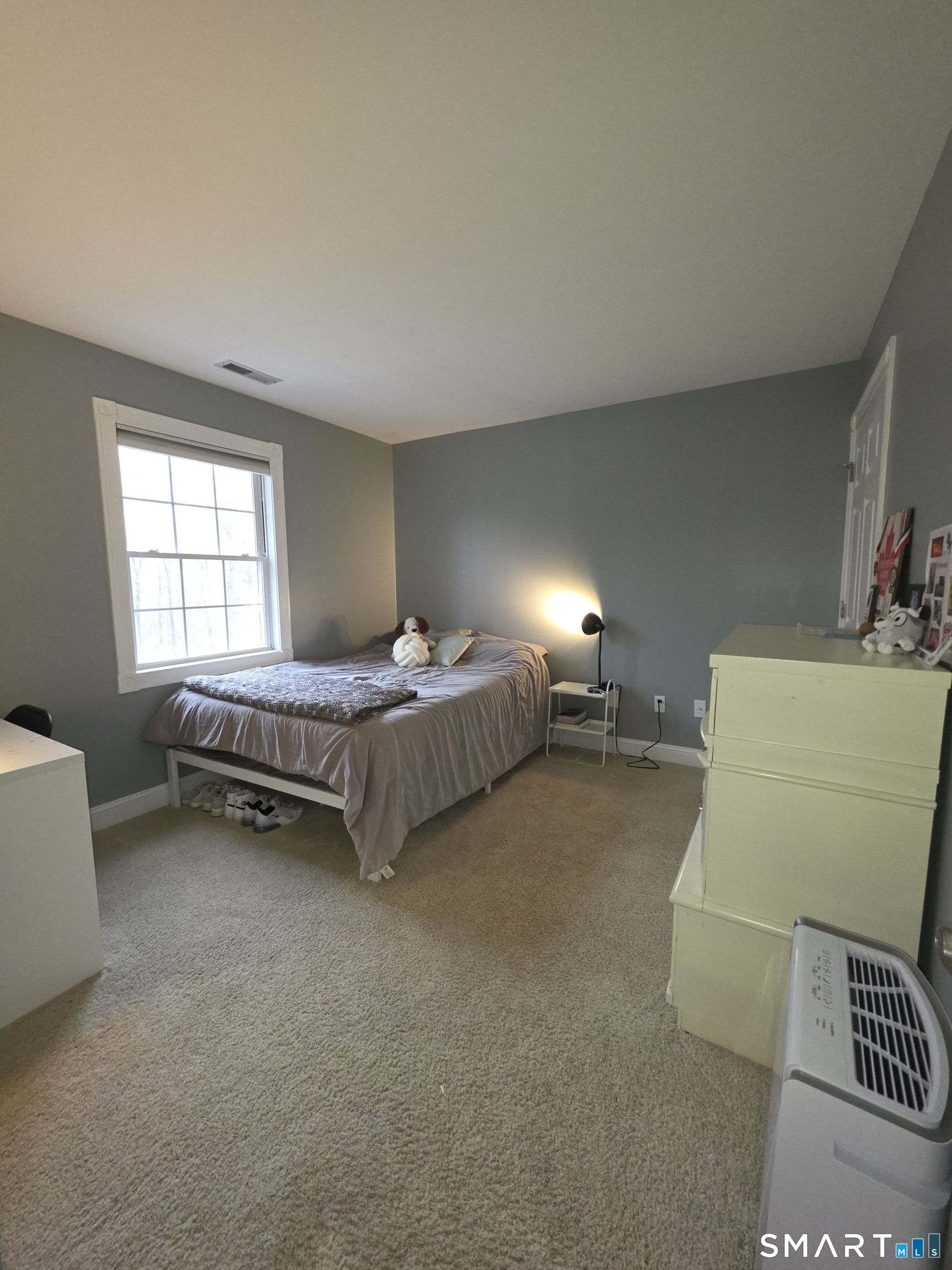 120 Woodbine Road Colchester, CT 06415 - Photo 17 of 24 a bedroom with bed and window