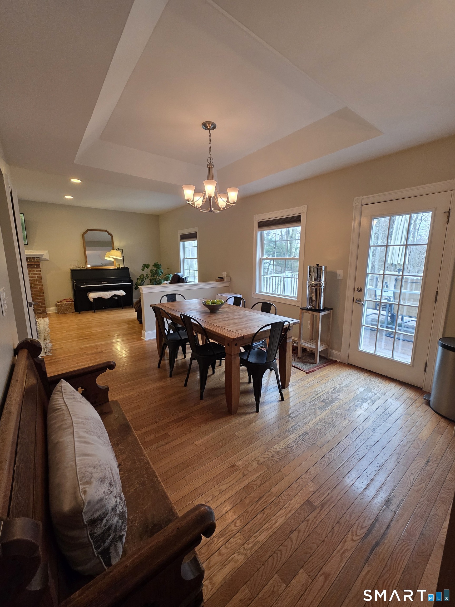 120 Woodbine Road Colchester, CT 06415 - Photo 6 of 24 a view of a dining room with furniture window and wooden floor