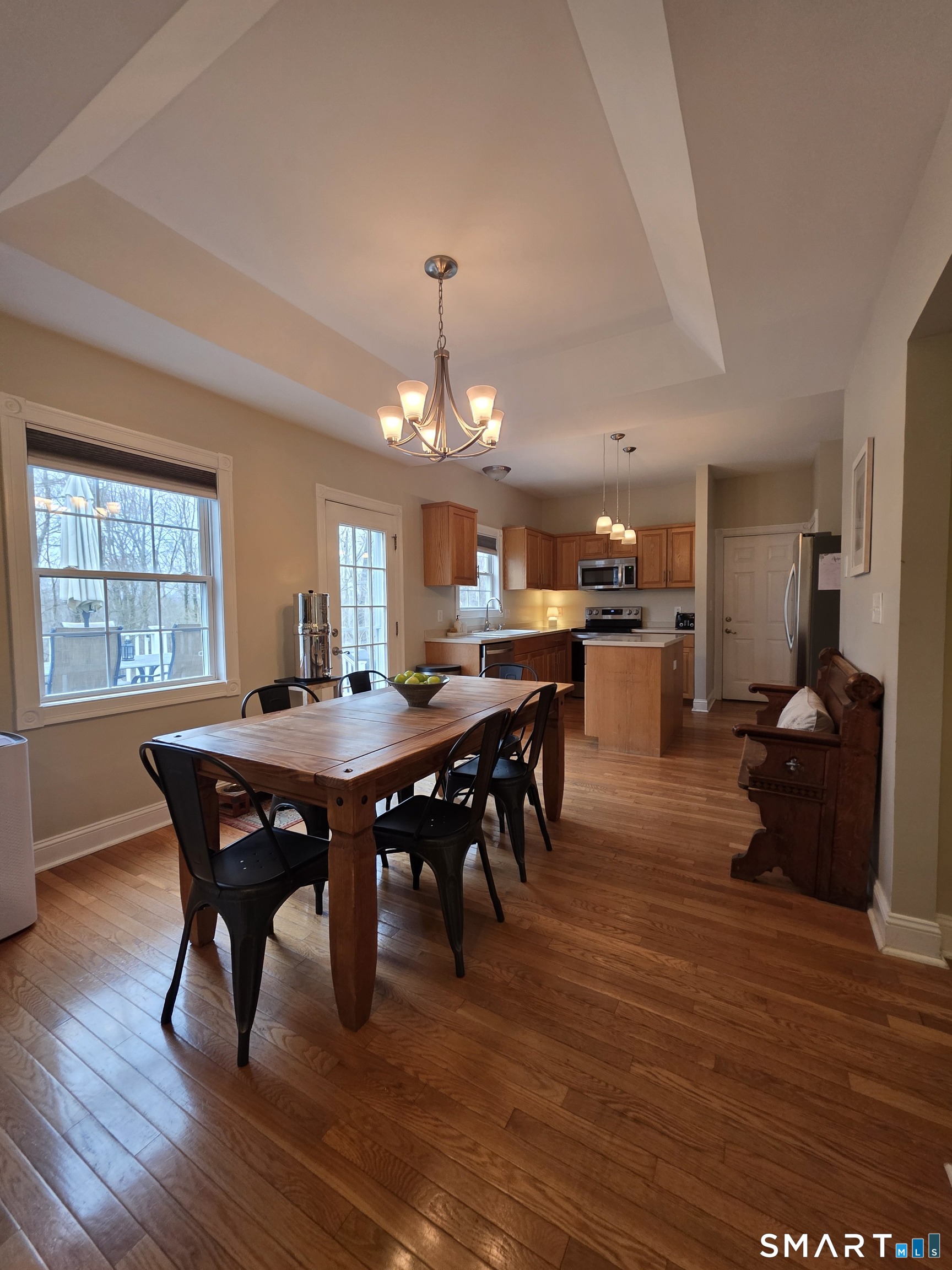 120 Woodbine Road Colchester, CT 06415 - Photo 8 of 24 a view of a dining room with furniture window and wooden floor
